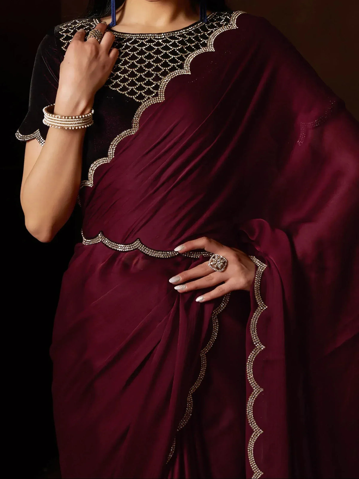 Maroon velvet saree with black blouse, heavy stone embroidery, ethnic Indian wear