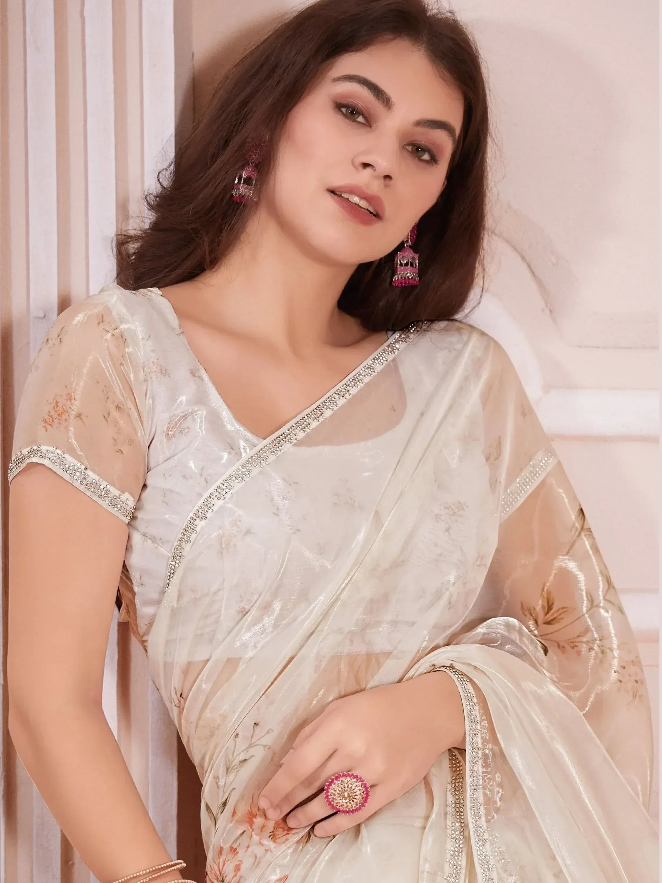 Elegant ivory floral saree with crystal border, perfect for Indian ethnic occasions