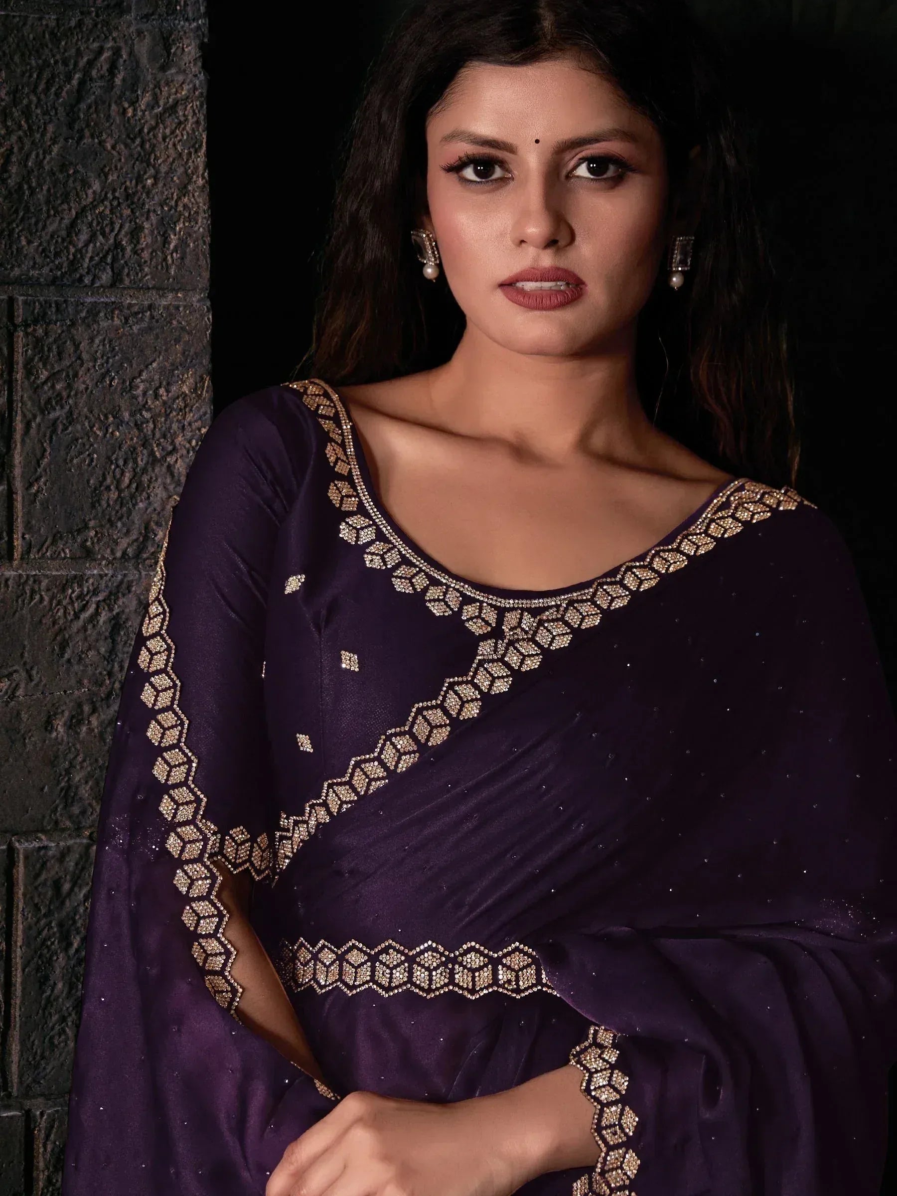 Purple designer saree with gold embroidery, perfect for ethnic occasions and festive wear.
