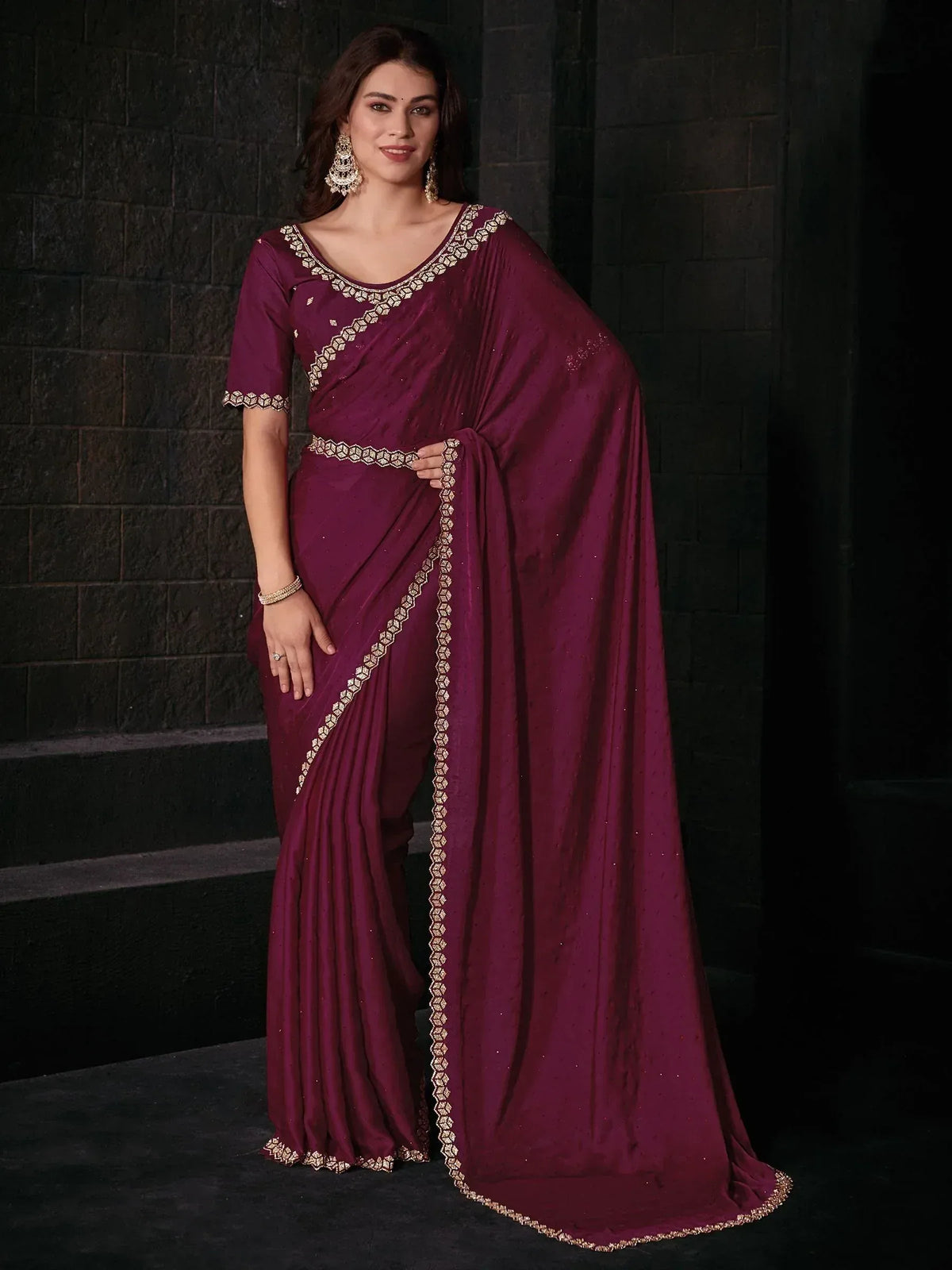 Elegant maroon saree with gold embroidery, perfect for Indian ethnic occasions and festive wear.