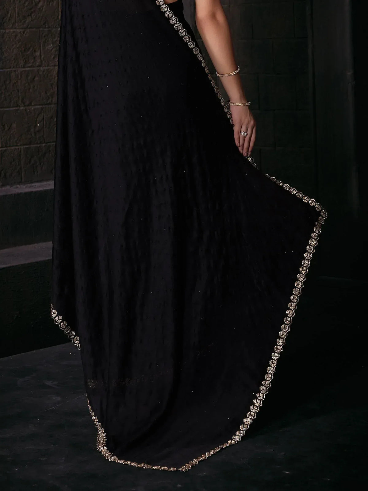 Black ethnic gown with gold embroidery, perfect for Indian occasions and parties