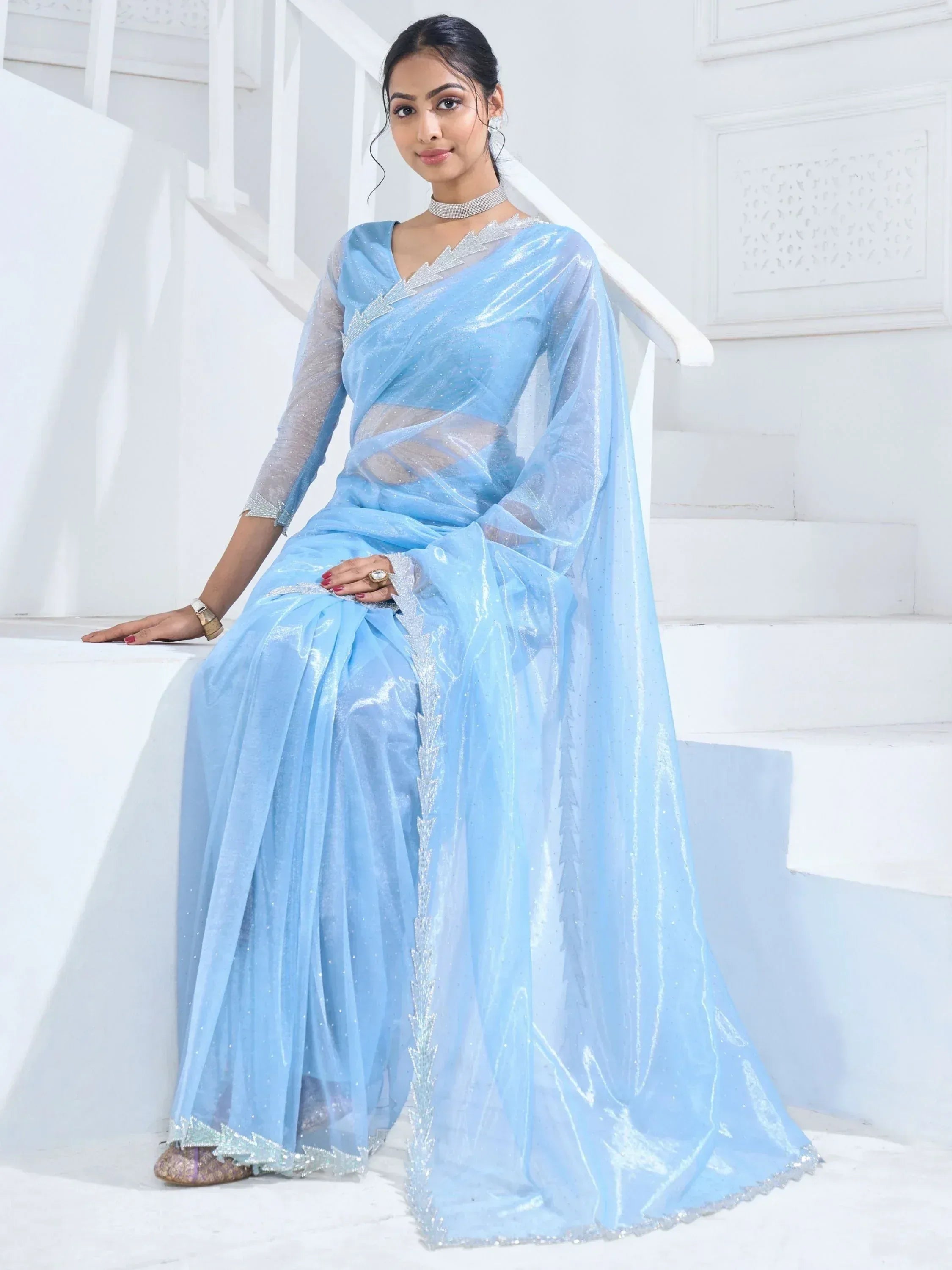 Light blue shimmer saree with silver embroidery, perfect for Indian ethnic wear events