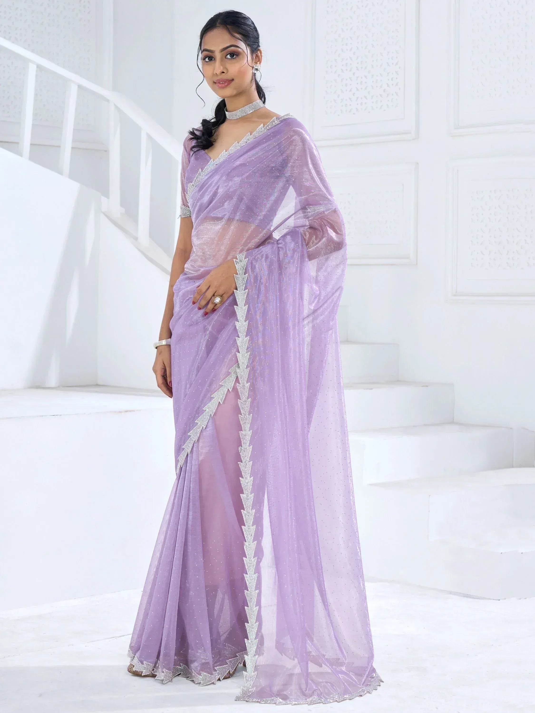 Lavender designer saree with silver zari work, perfect for Indian ethnic wear occasions