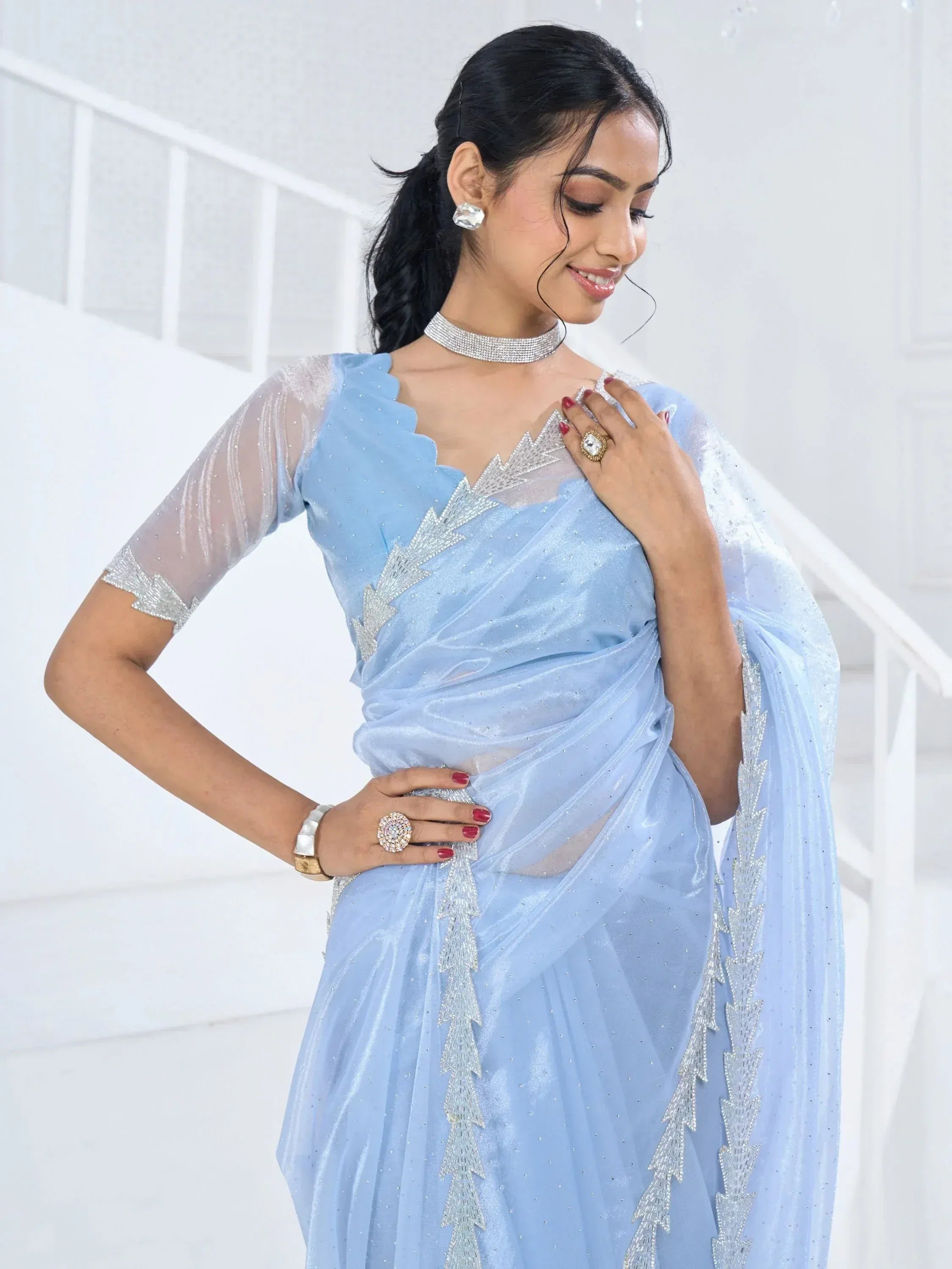 Light blue designer saree with silver embroidery, perfect for Indian ethnic wear events