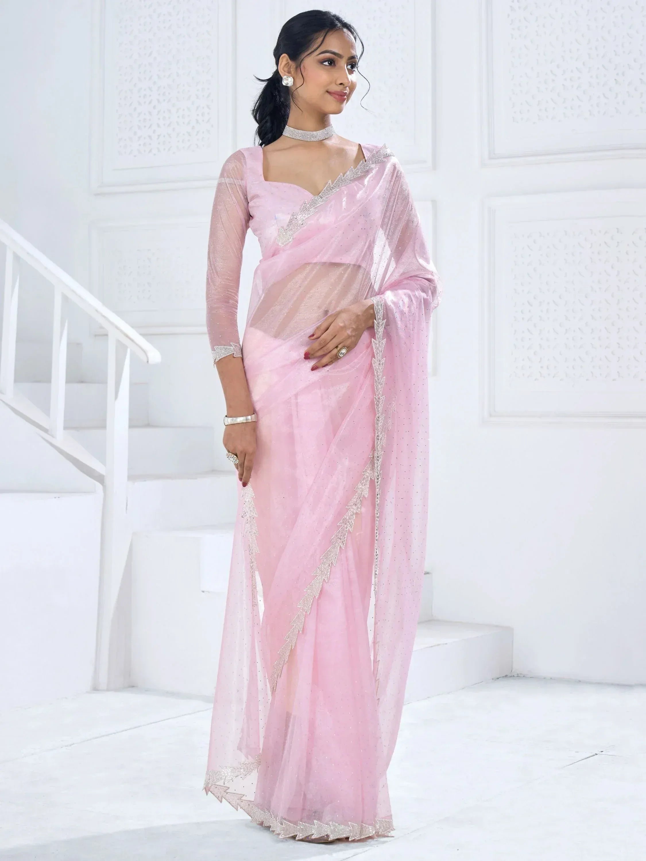 Pink sheer saree with silver embroidery, perfect for Indian ethnic wear and festive occasions