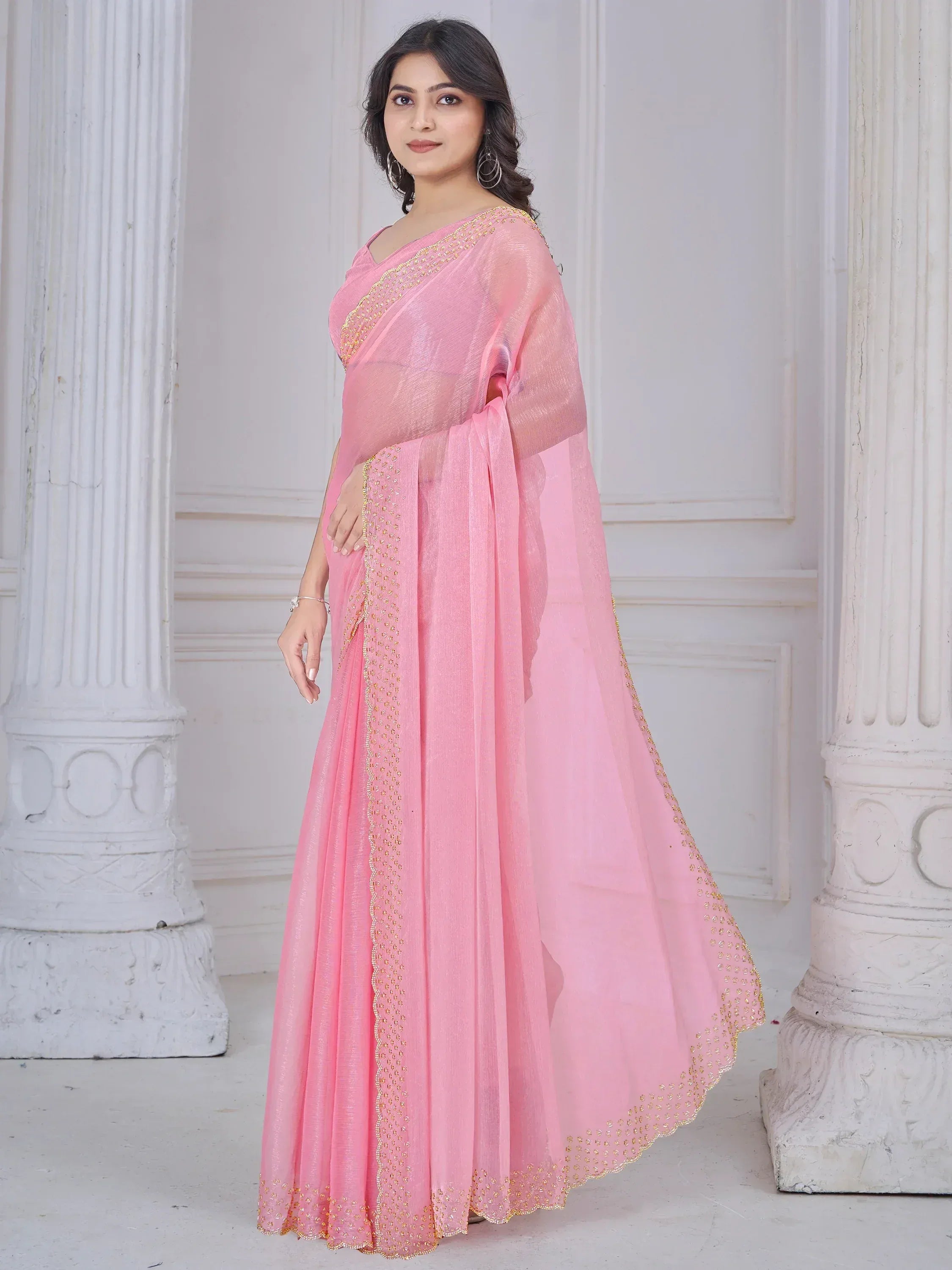 Pink saree with gold embroidery, elegant Indian ethnic wear for women