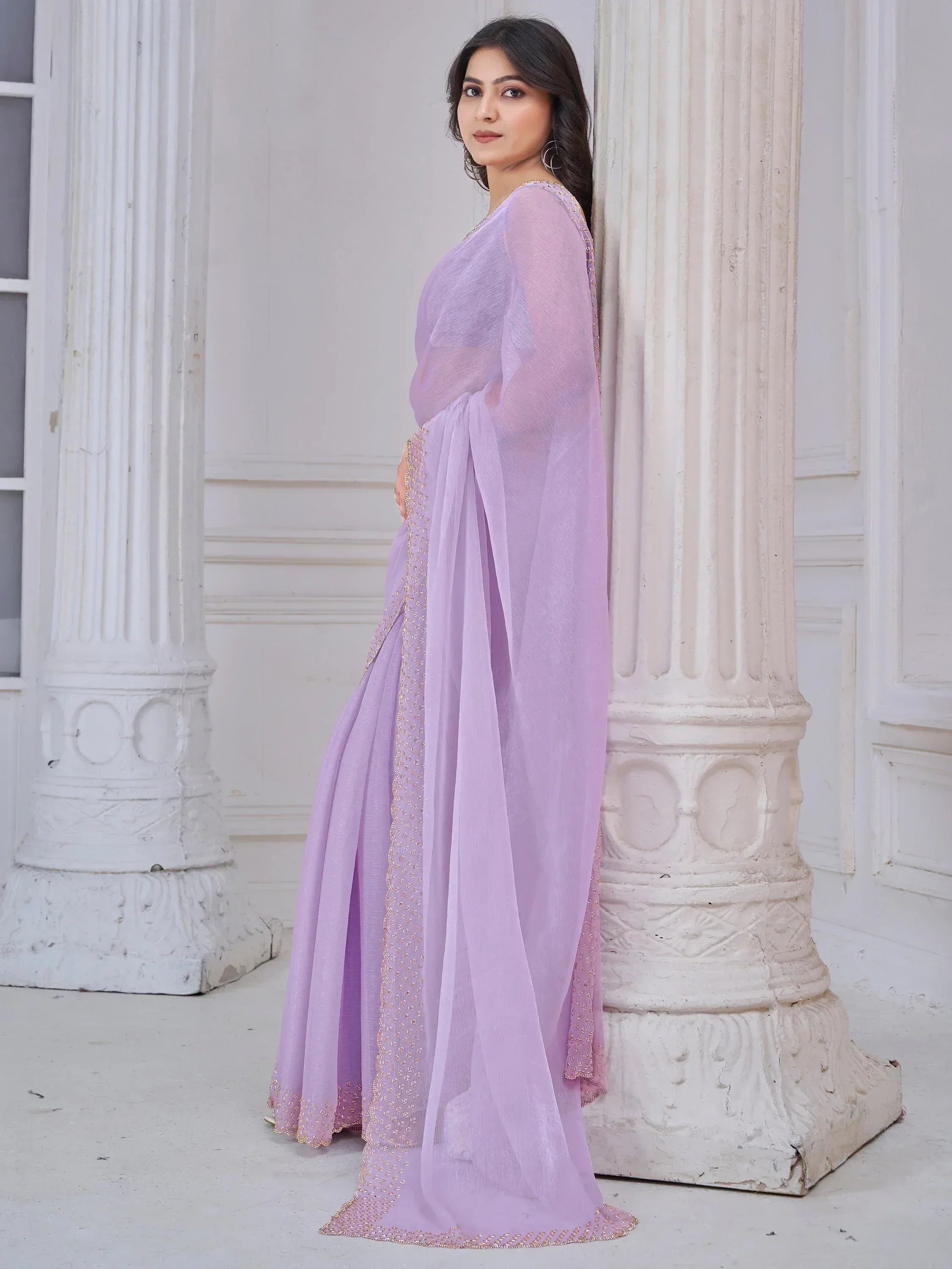Lavender ethnic saree with gold embroidery, styled for Indian occasions