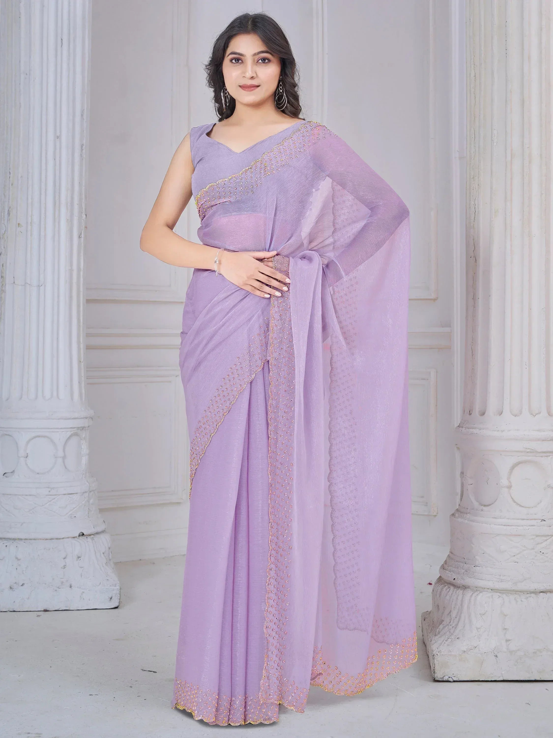 Lavender ethnic saree with gold embroidery, perfect for Indian occasions and festive wear.