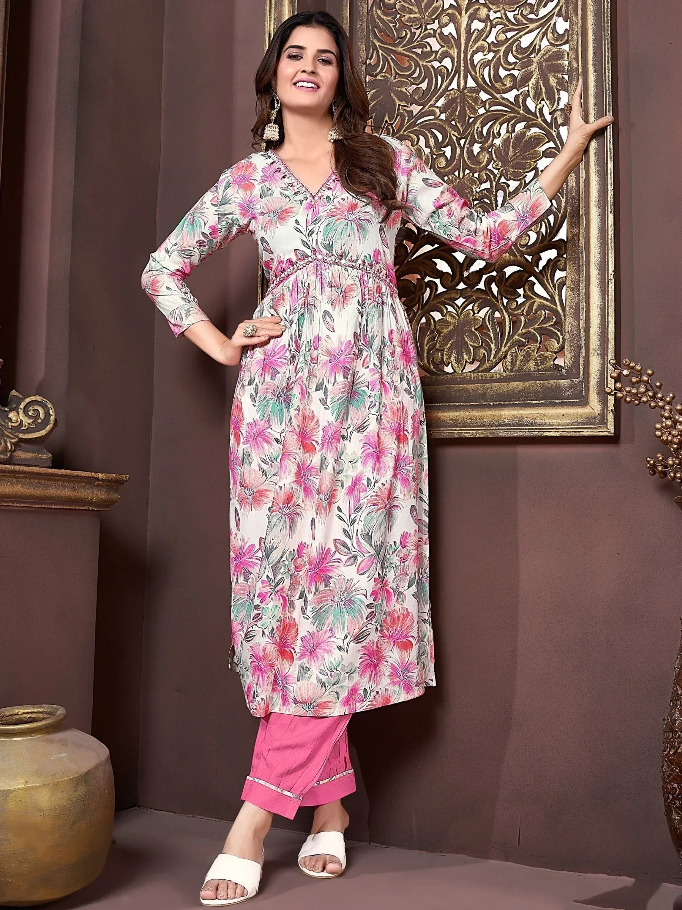 Floral printed ethnic kurti with pink palazzo pants, perfect for Indian wear