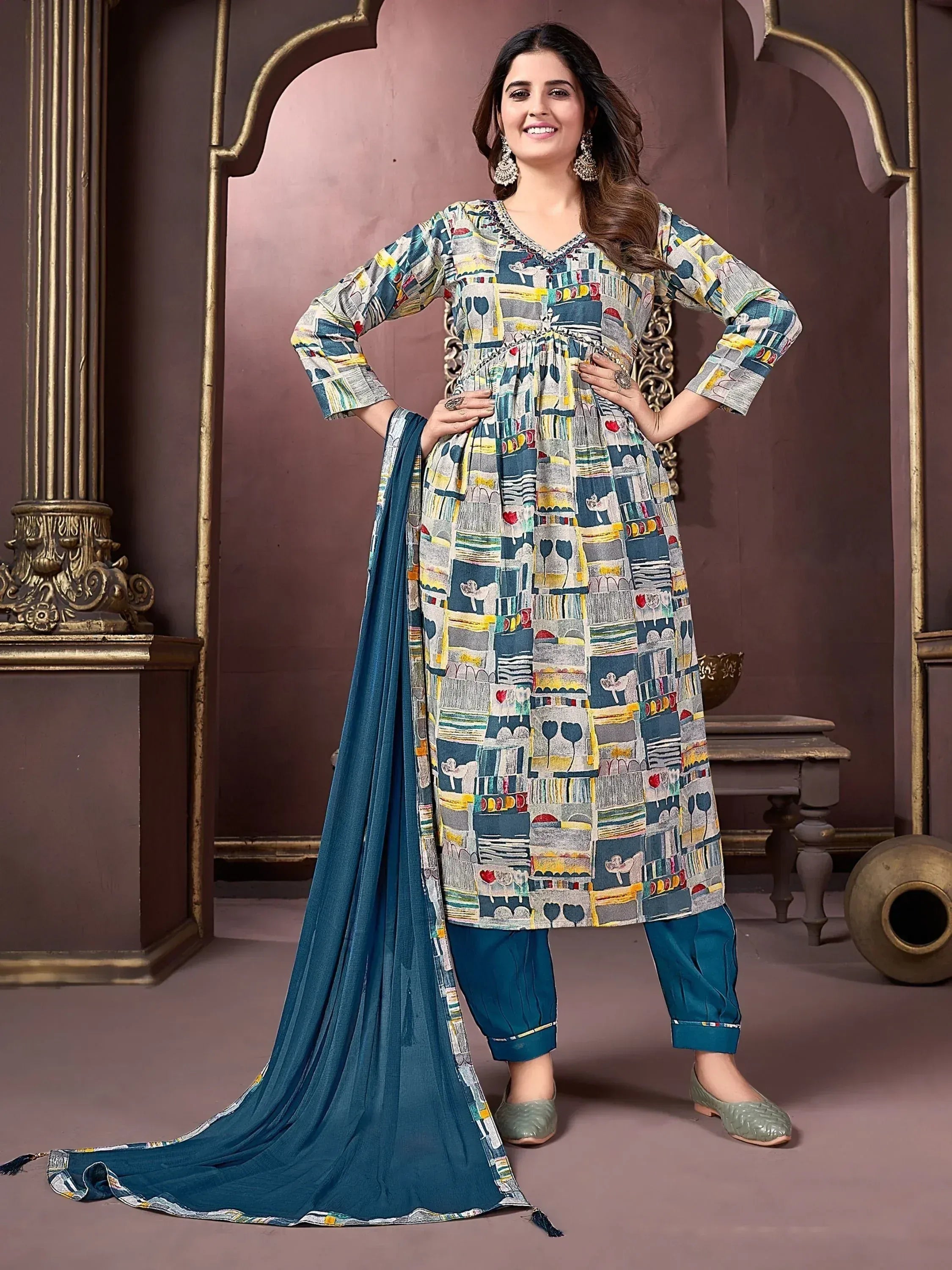 Woman in printed kurta with teal palazzo and dupatta, Indian ethnic wear