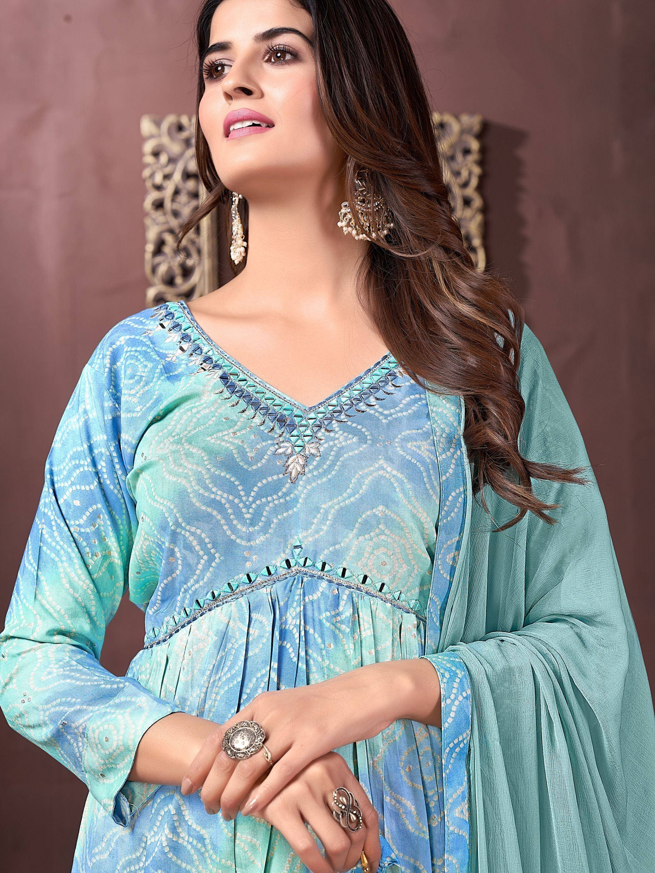 Blue printed ethnic kurta with mirror work, paired with matching dupatta, ideal for festive occasions