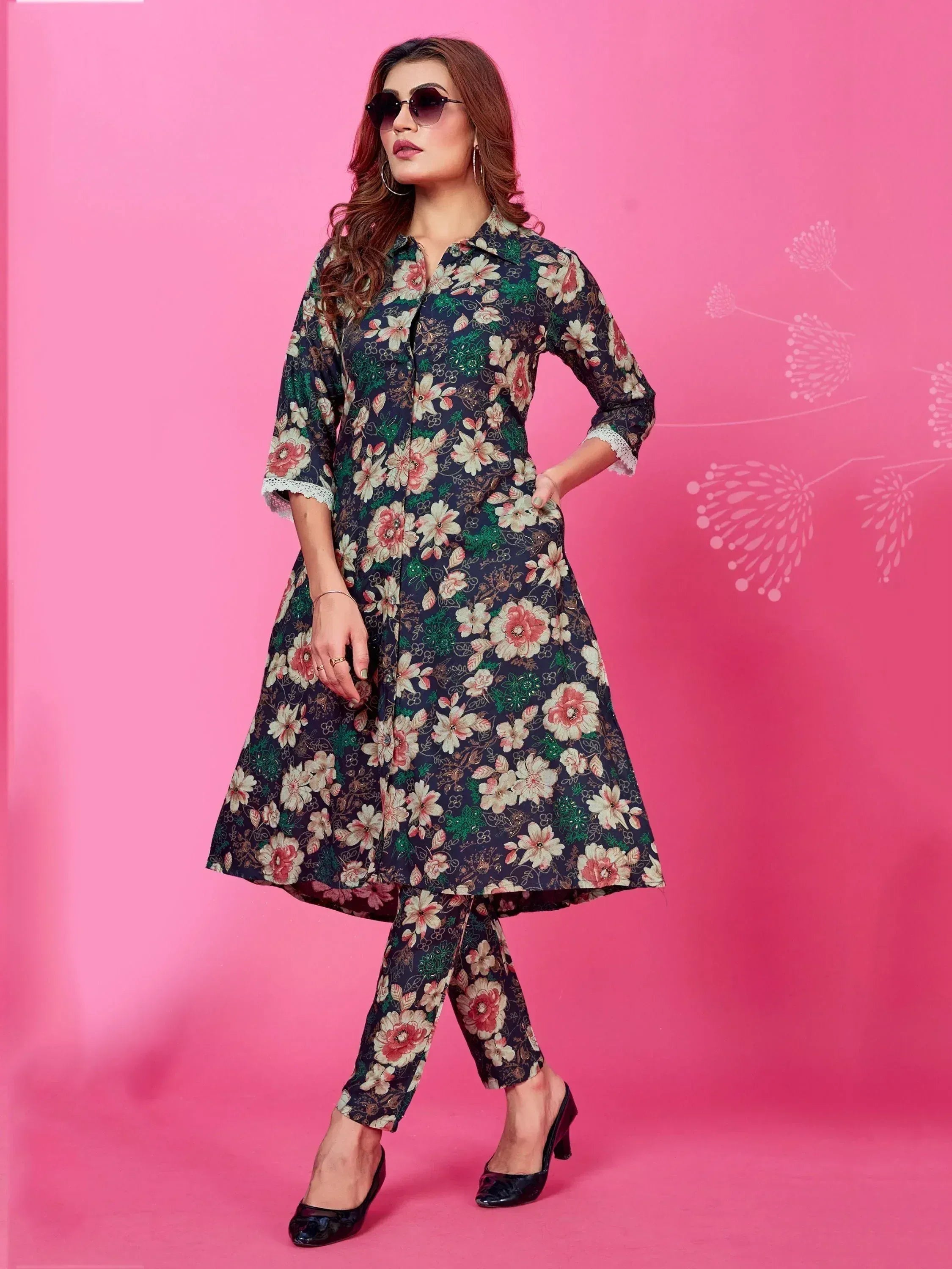 Floral print Indian kurta and pants set for women, stylish ethnic wear with lace cuffs, perfect for casual occasions.