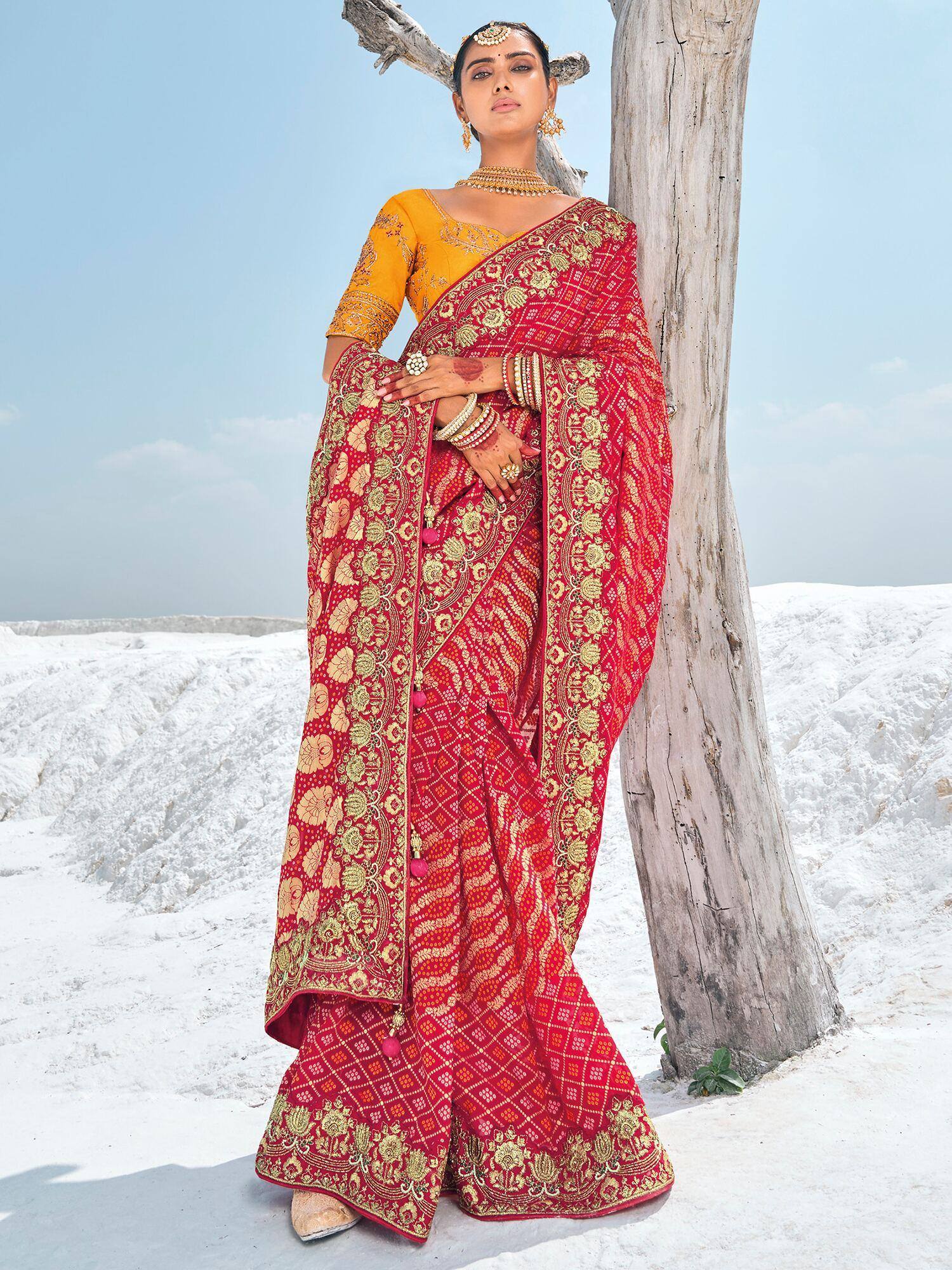 Red and gold embroidered saree with yellow blouse, perfect for Indian ethnic occasions and weddings