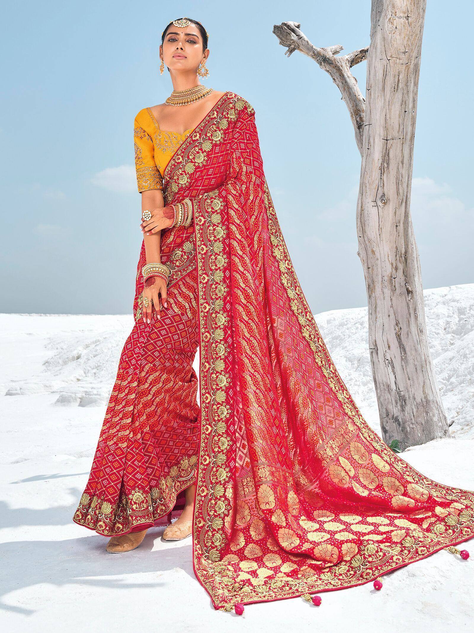Red and gold embroidered saree with yellow blouse, styled for Indian ethnic wear