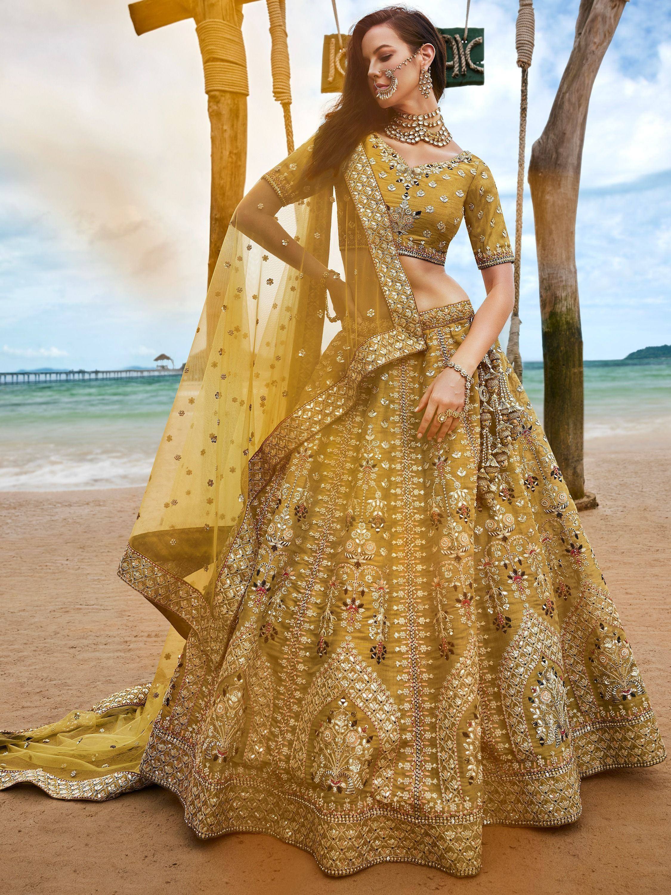 Golden embroidered lehenga choli with dupatta, beach photoshoot, Indian ethnic wear
