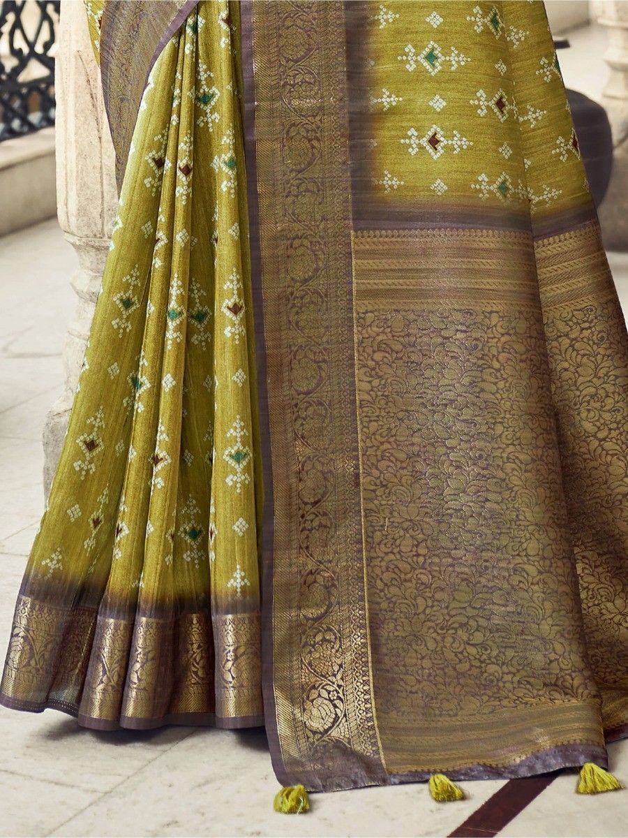 Olive green ethnic saree with diamond motifs and gold border, perfect for Indian occasions