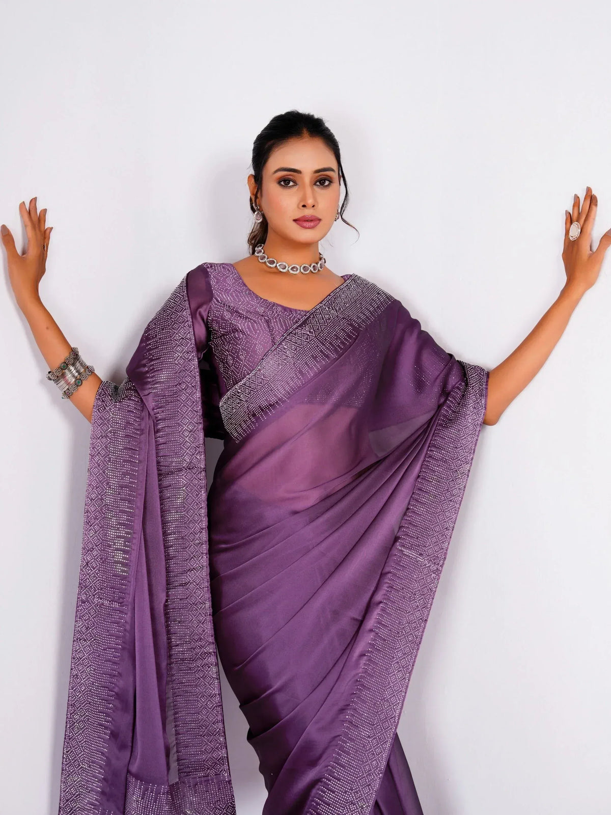 Purple designer saree with sequin detailing, perfect for Indian ethnic wear and festive occasions