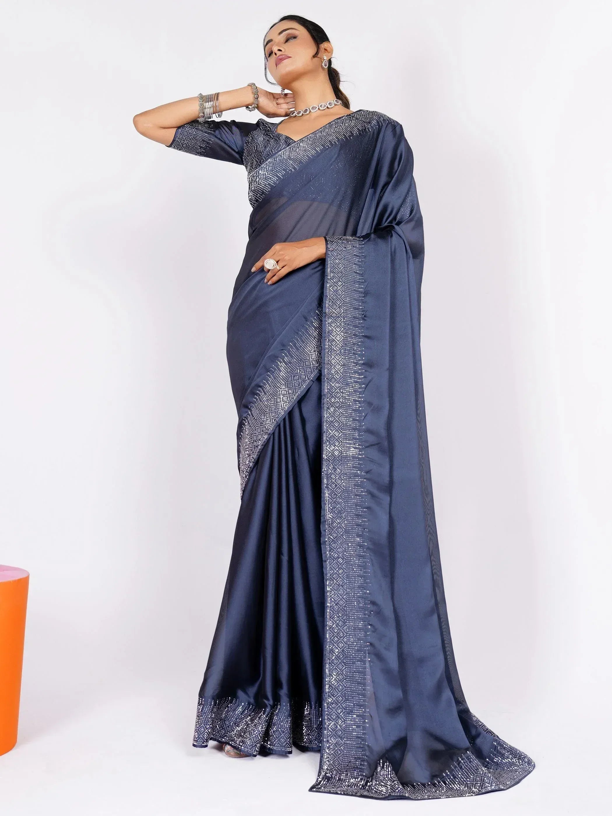 Navy blue designer saree with silver embellishments, perfect for Indian ethnic wear occasions