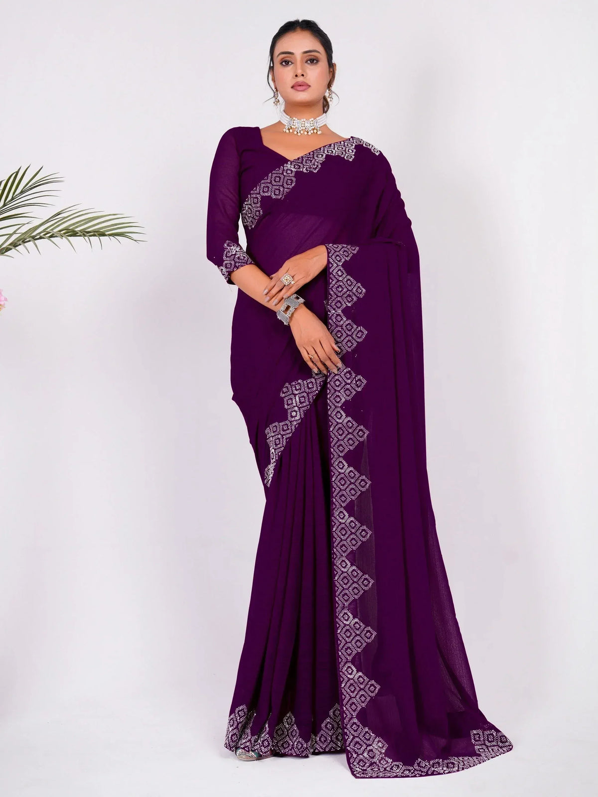 Purple ethnic saree with white geometric embroidery, perfect for Indian occasions and festive wear.