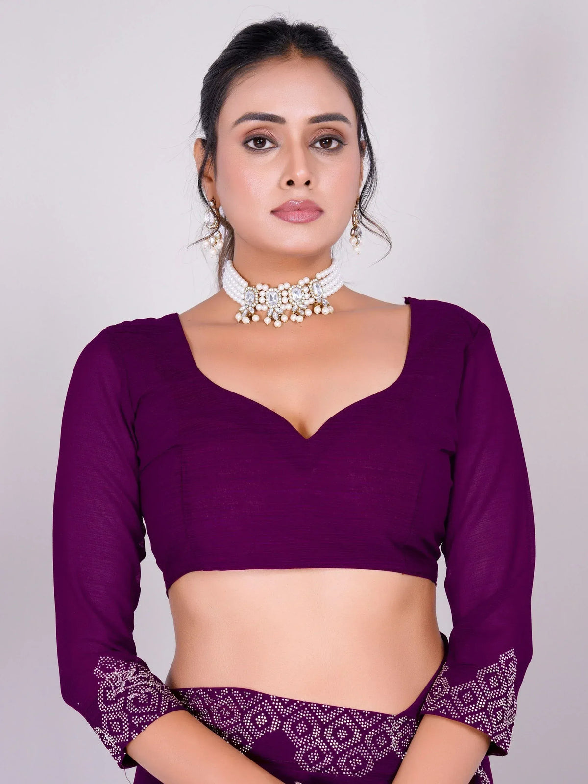 Purple ethnic blouse with pearl choker, perfect for Indian wear and festive occasions