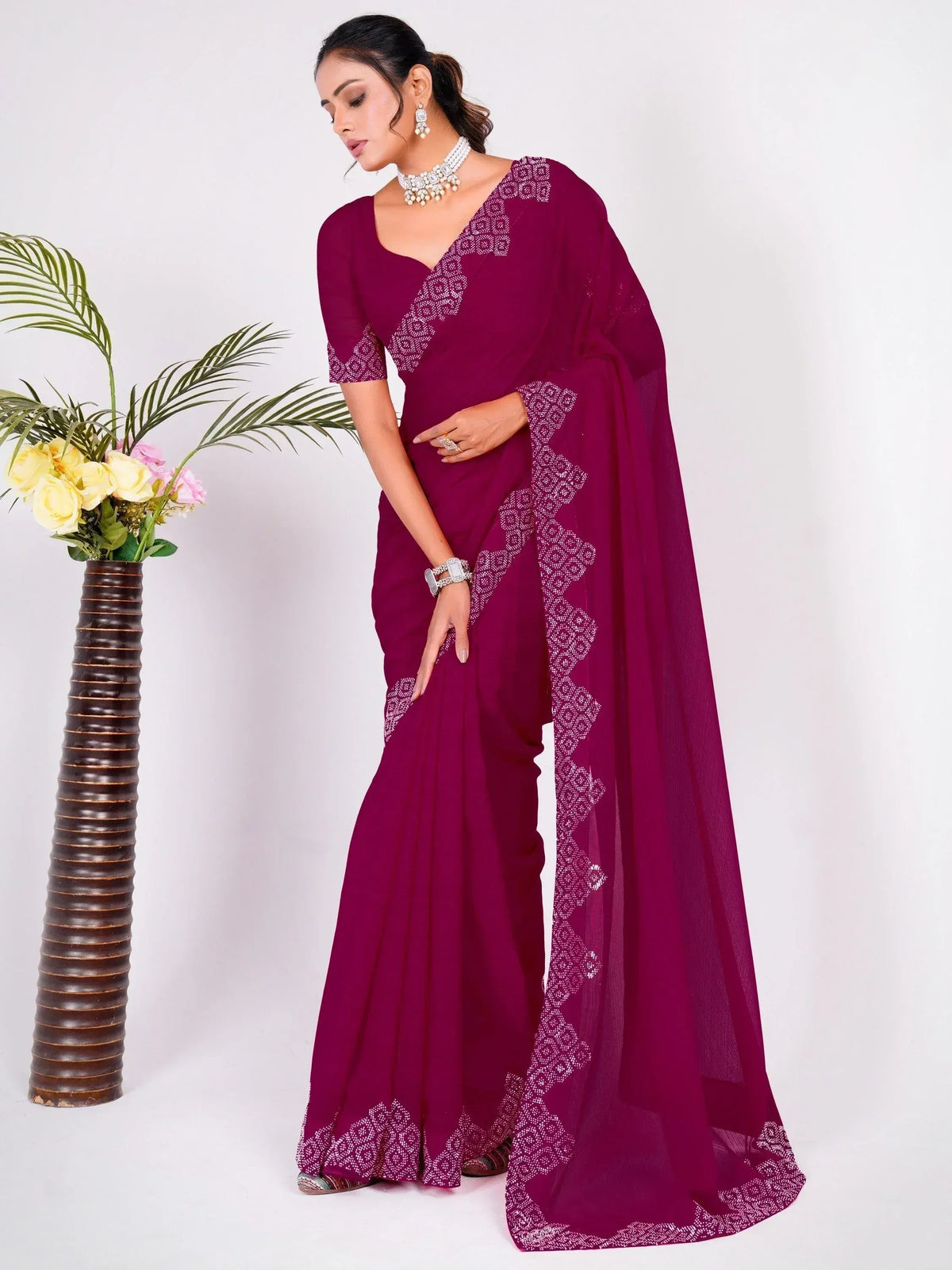 Elegant maroon saree with white embroidery, perfect for Indian ethnic wear and festive occasions.
