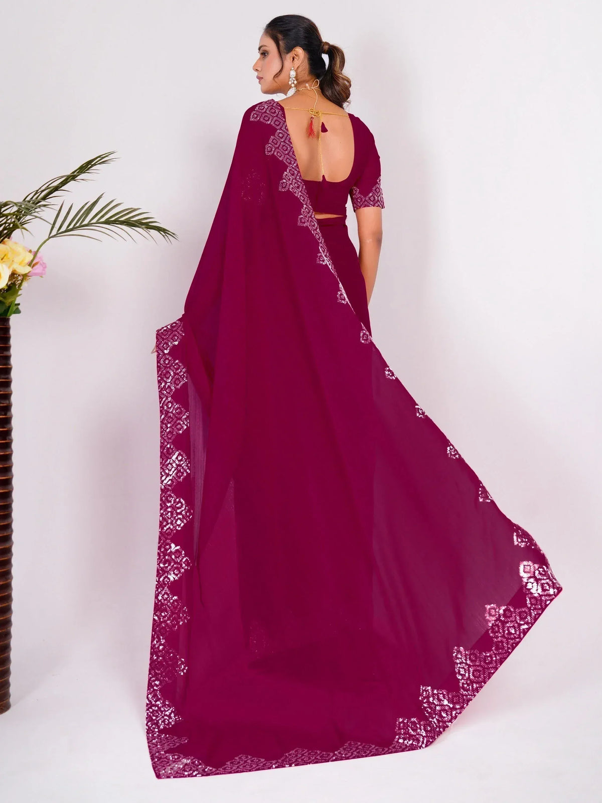 Magenta saree with white embroidery, backless blouse, and sheer dupatta for Indian ethnic wear