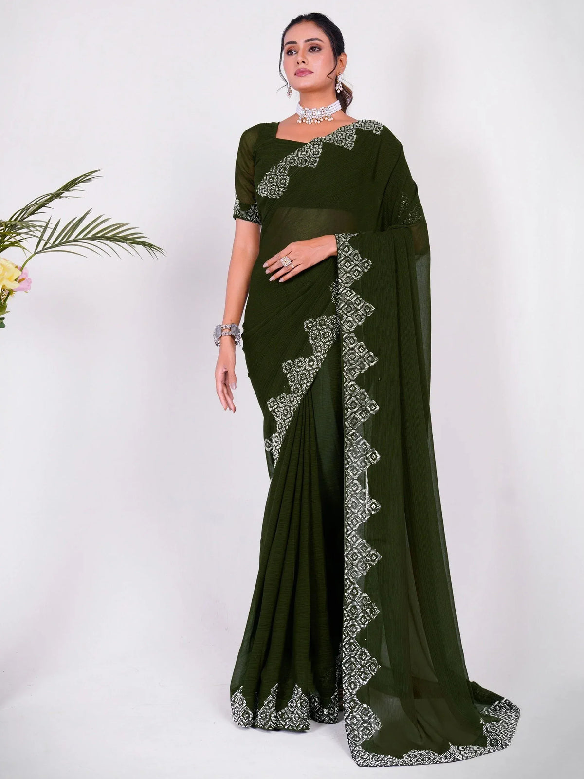 Olive green saree with white geometric embroidery, perfect for Indian ethnic occasions
