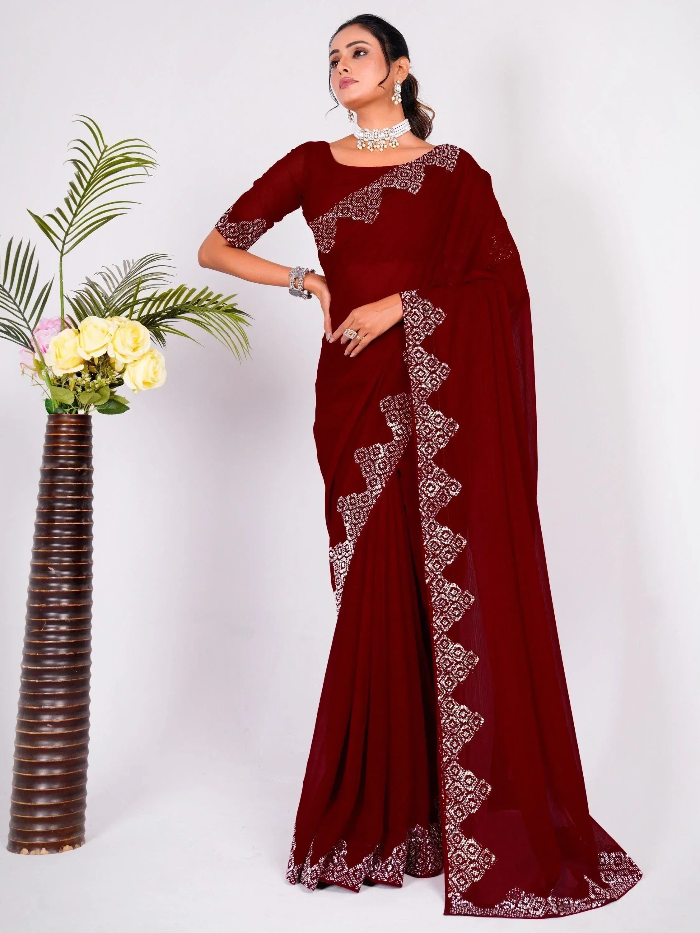 Maroon saree with white geometric embroidery, elegant Indian ethnic wear for women
