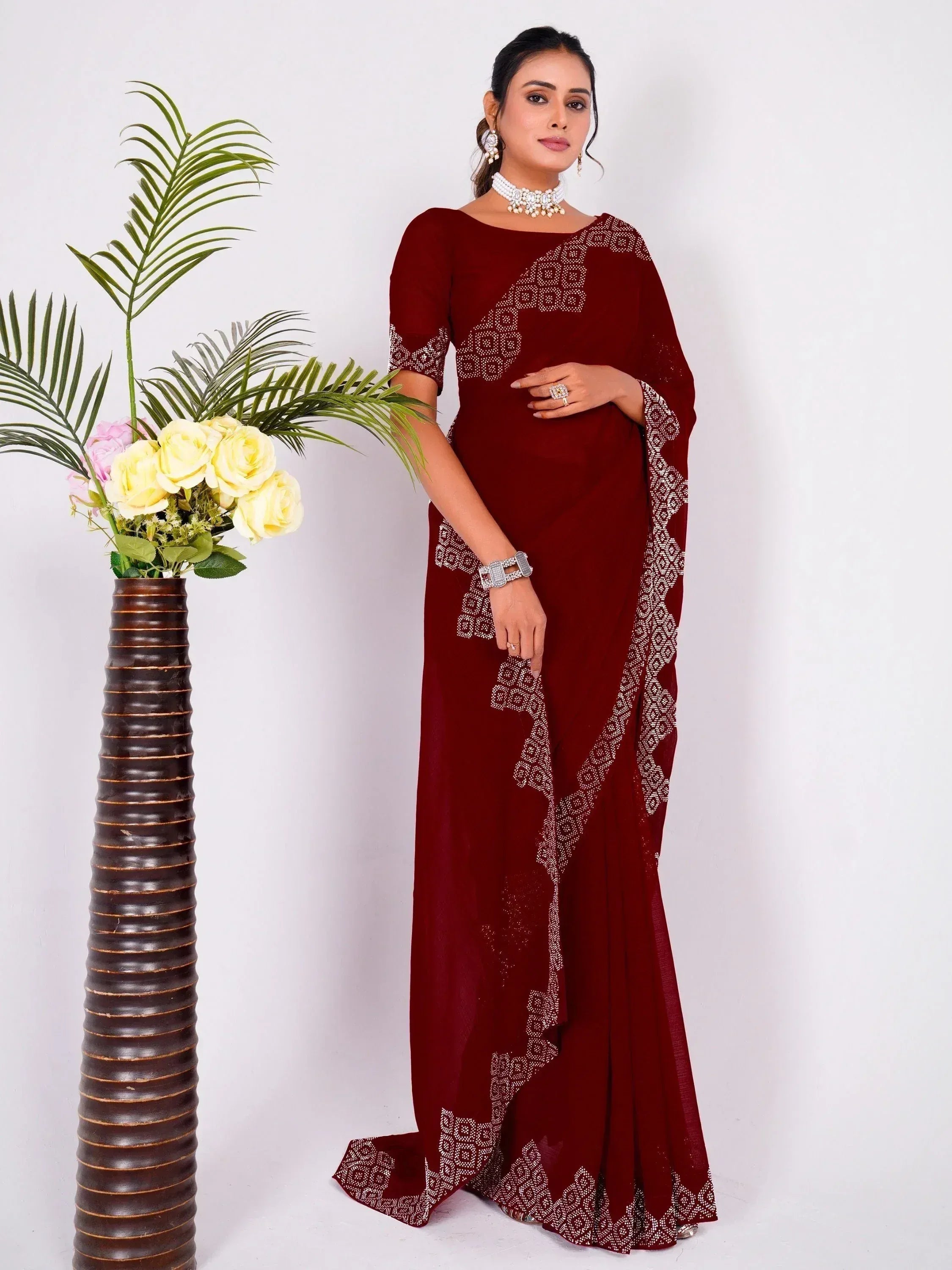 Maroon saree with white geometric embroidery, elegant ethnic wear for women