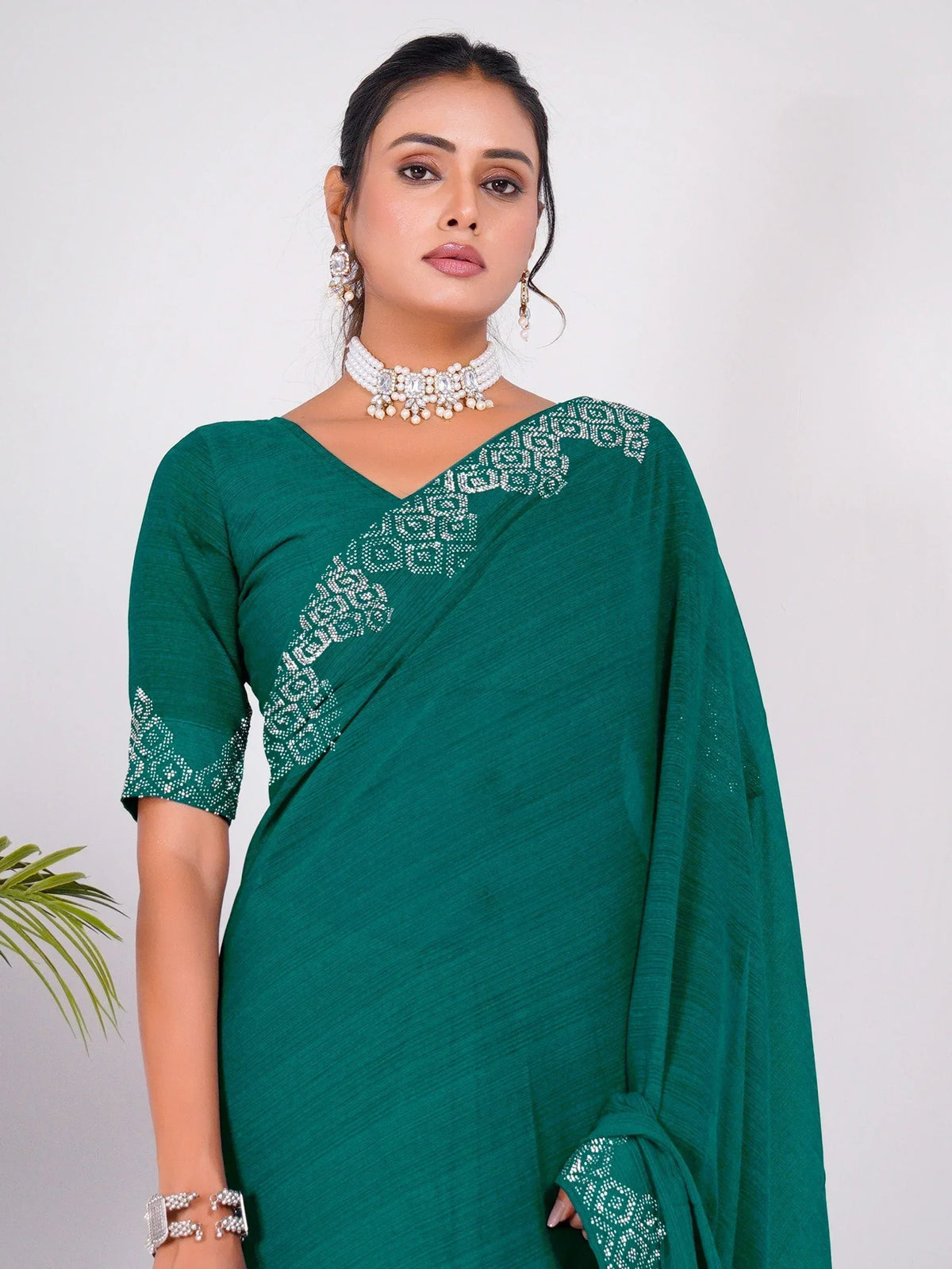 Emerald green saree with white embroidery, perfect for Indian ethnic wear occasions