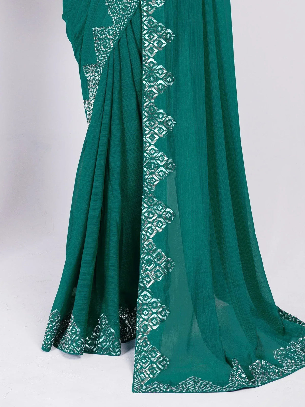 Emerald green saree with white geometric embroidery, elegant Indian ethnic wear for women