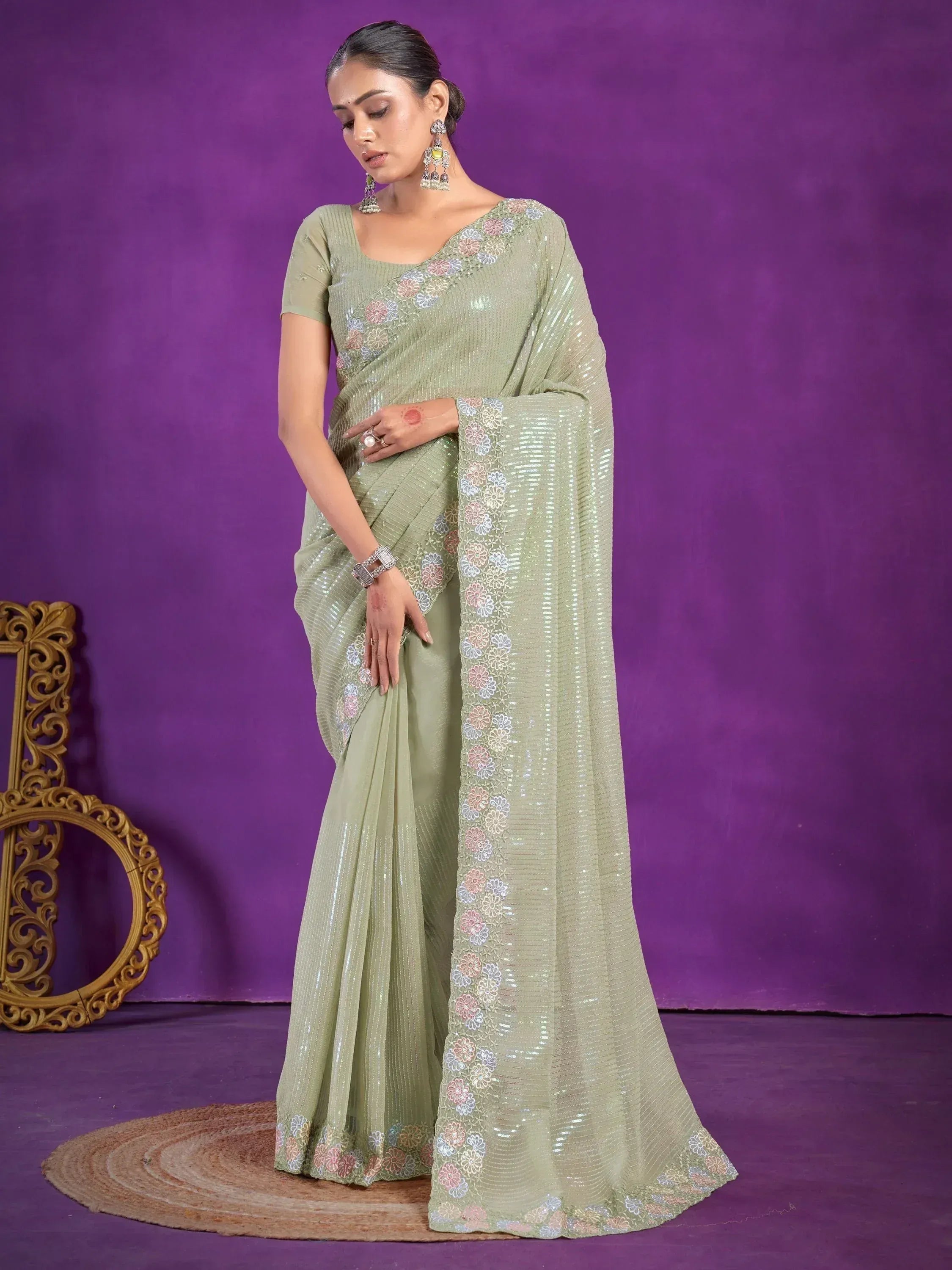 Elegant olive green sequin saree with floral embroidery, perfect for Indian ethnic occasions