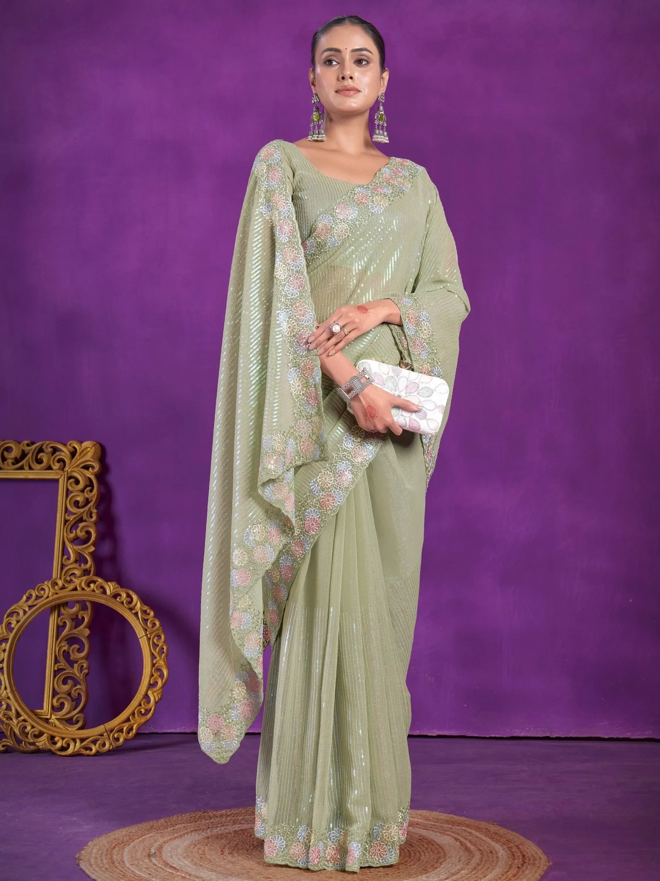 Fascinating Pista Green Sequins Organza Reception Wear Saree