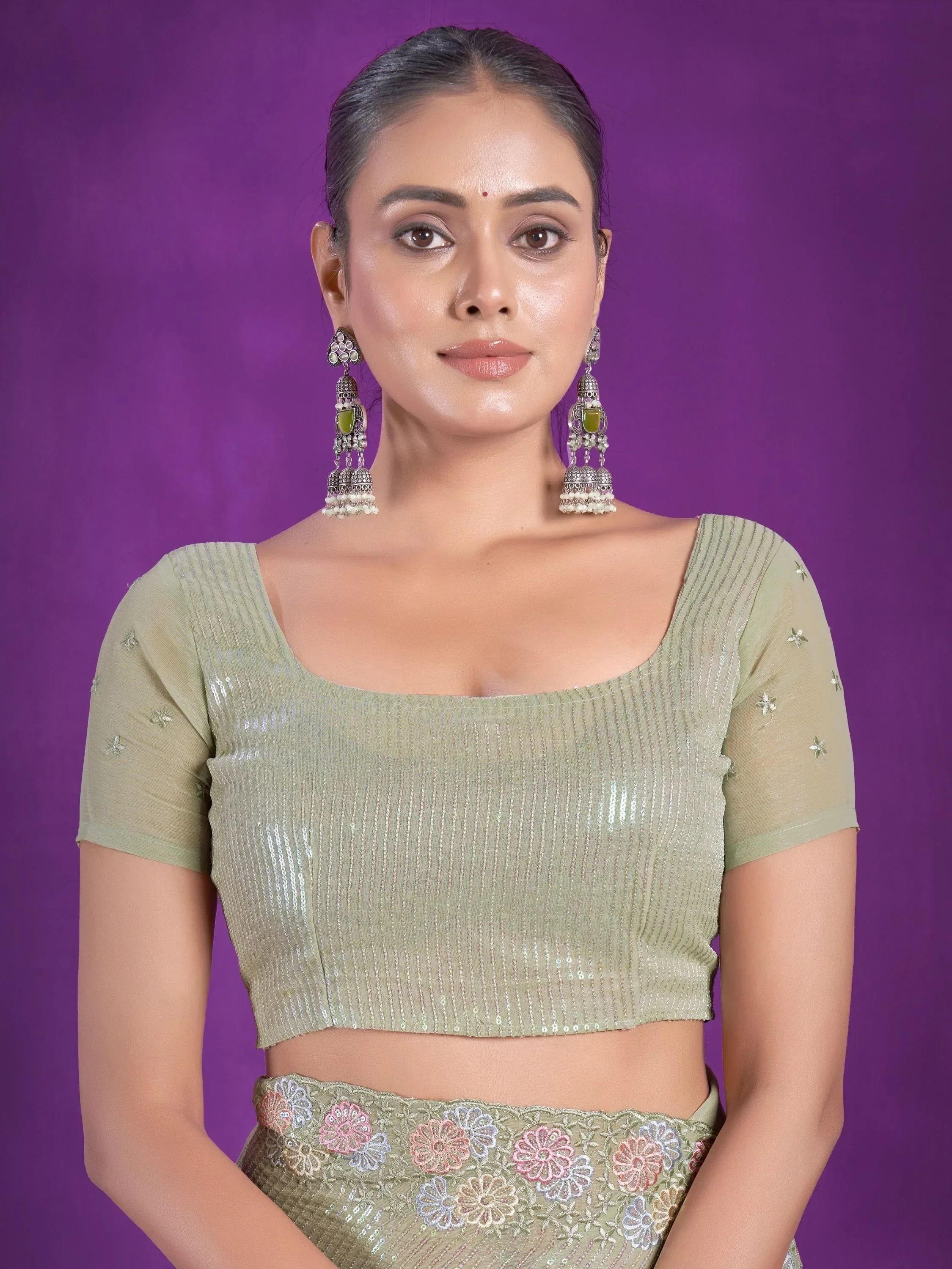 Fascinating Pista Green Sequins Organza Reception Wear Saree