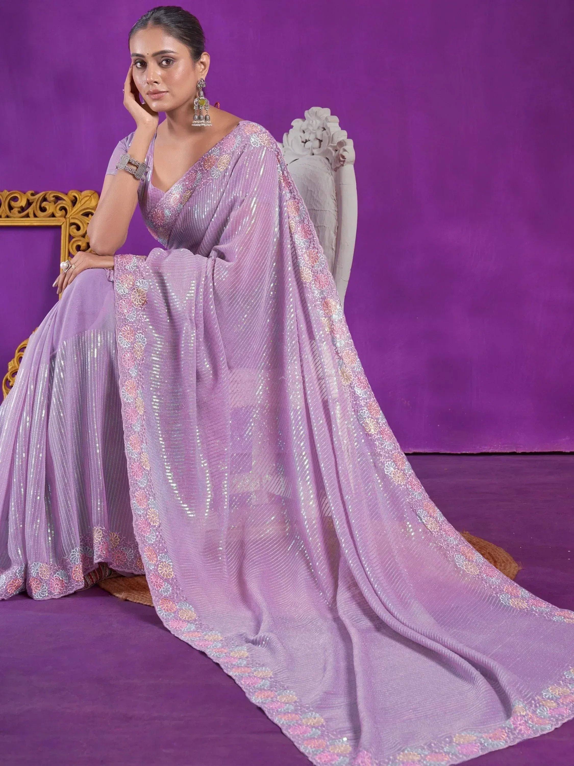 Lavender ethnic gown with floral embroidery and sequin detailing, perfect for Indian celebrations