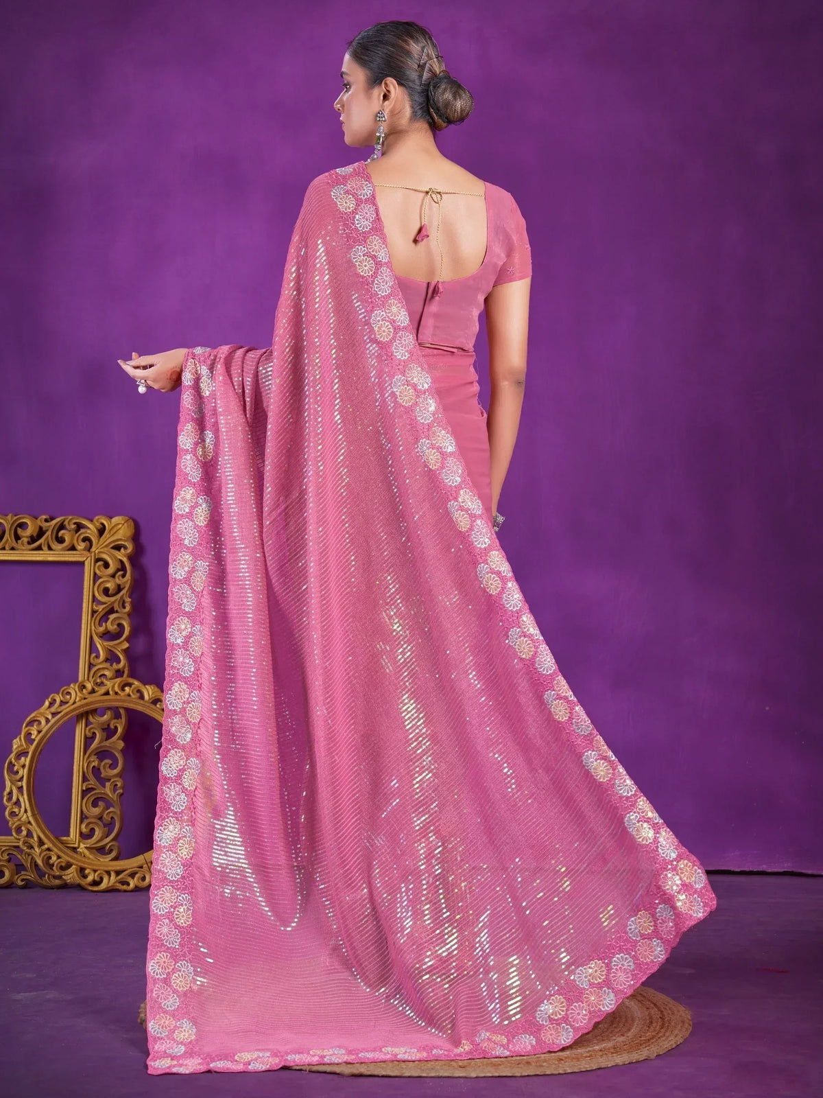 Pink designer saree with floral embroidery and sequins, perfect for Indian ethnic wear occasions