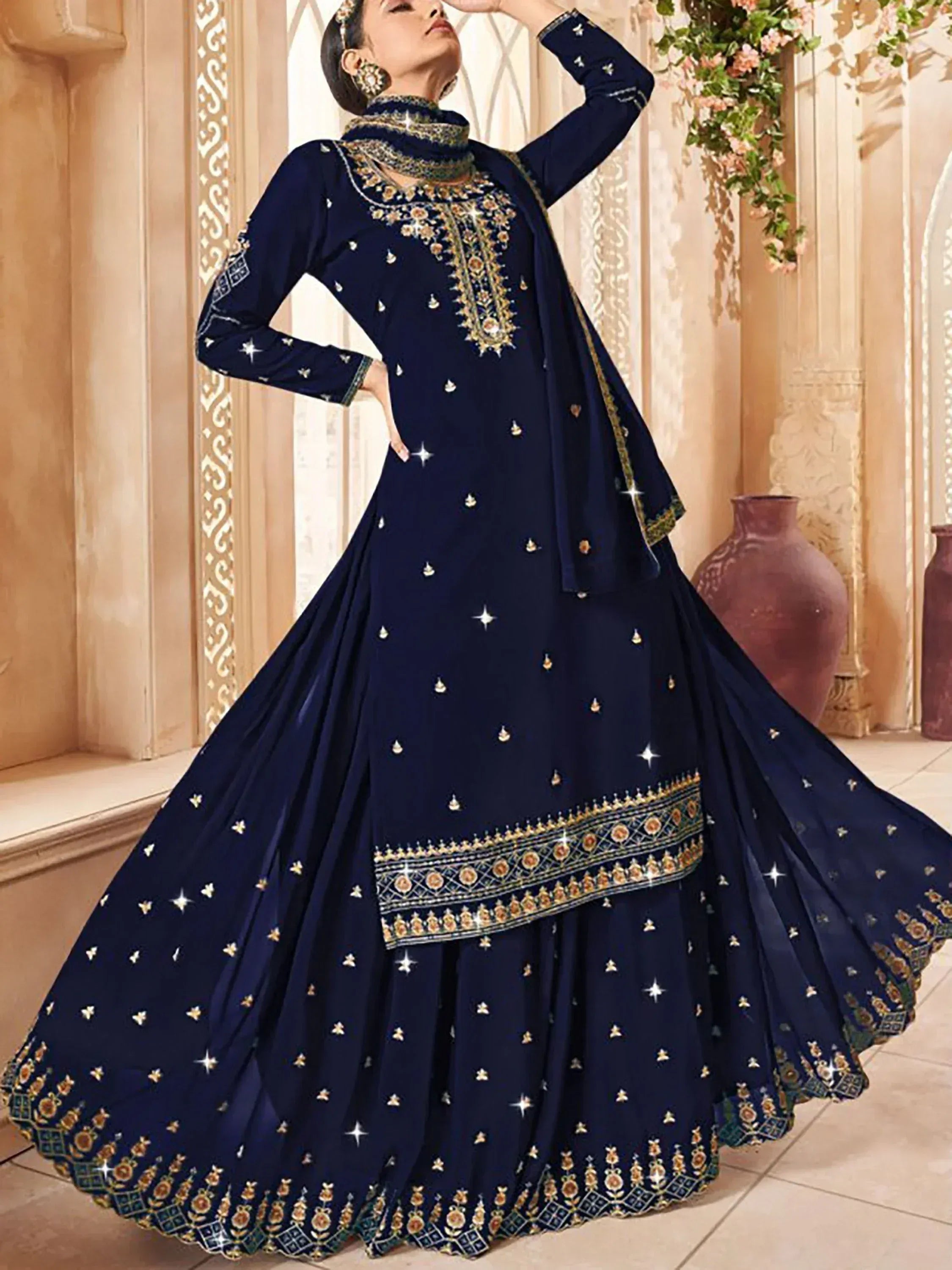 Navy blue designer anarkali suit with gold embroidery and star motifs, perfect for Indian ethnic occasions.