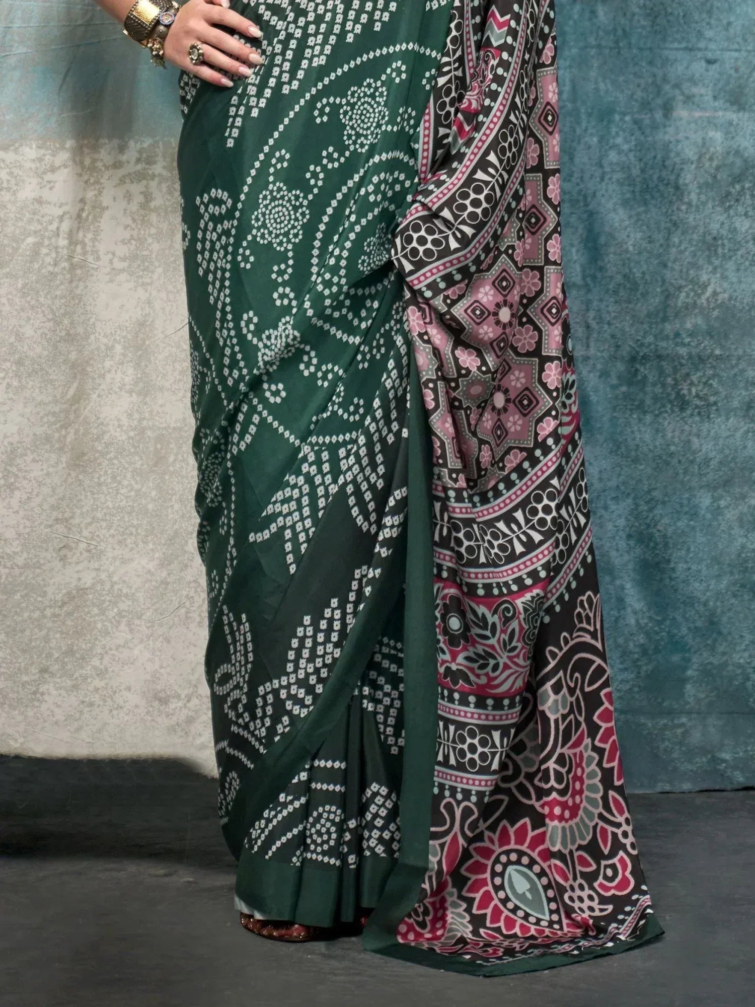 Green printed saree with floral and geometric patterns, ideal for ethnic wear occasions