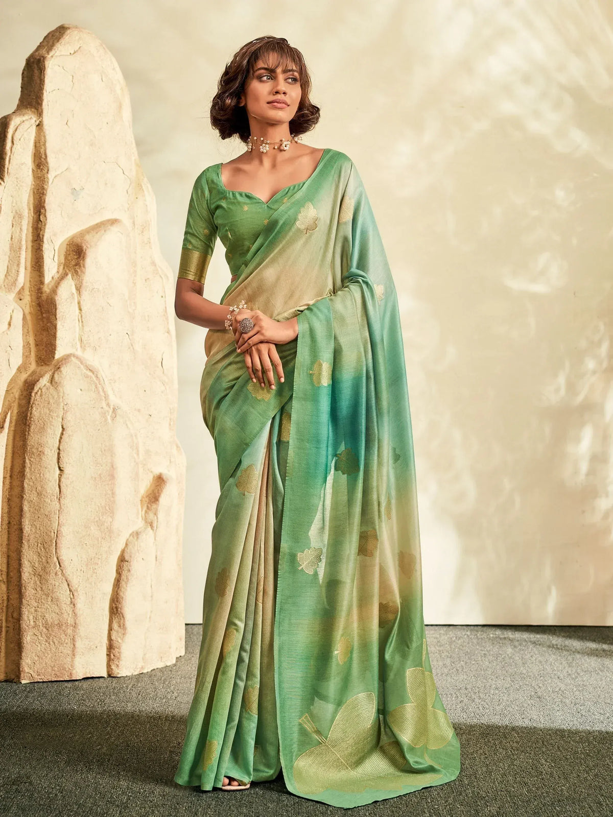 Green ombre saree with gold leaf print, styled with matching blouse for Indian ethnic wear