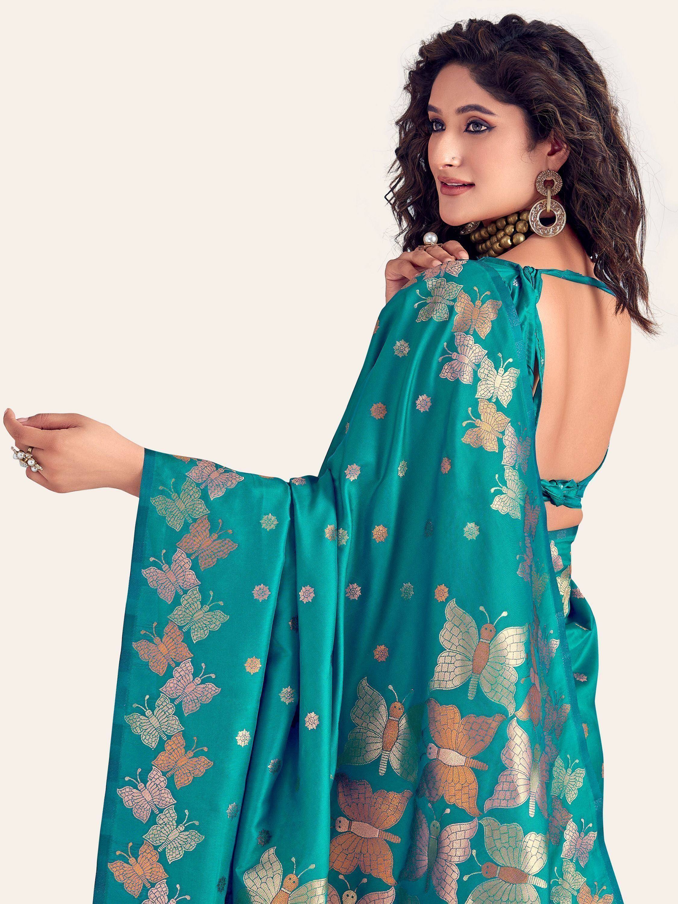 Teal ethnic gown with butterfly print, open back design, perfect for festive occasions