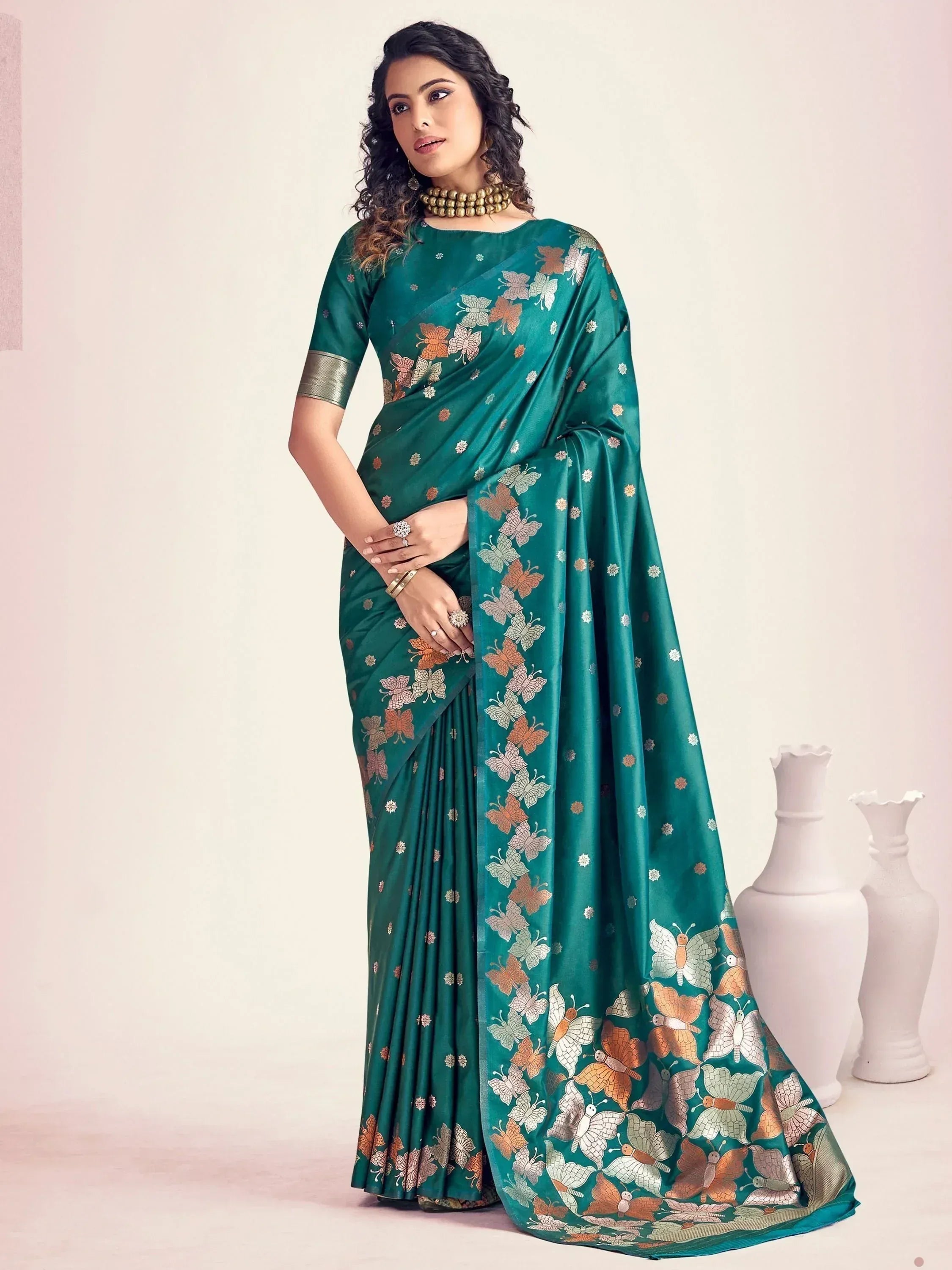 Emerald green saree with butterfly print, perfect for Indian ethnic wear and festive occasions.
