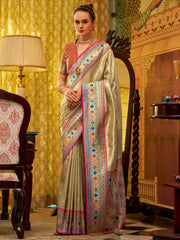 Fascinating Beige Zari Weaving Tissue Silk Traditional Saree With Blouse