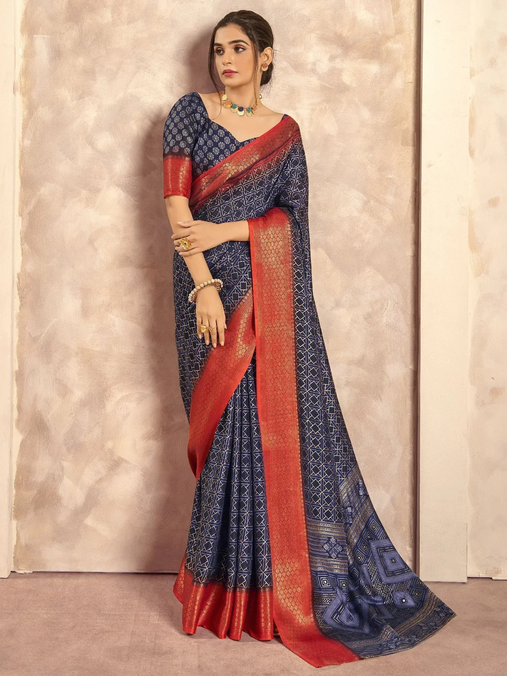 Navy blue and red printed saree with geometric pattern, perfect for Indian ethnic wear occasions
