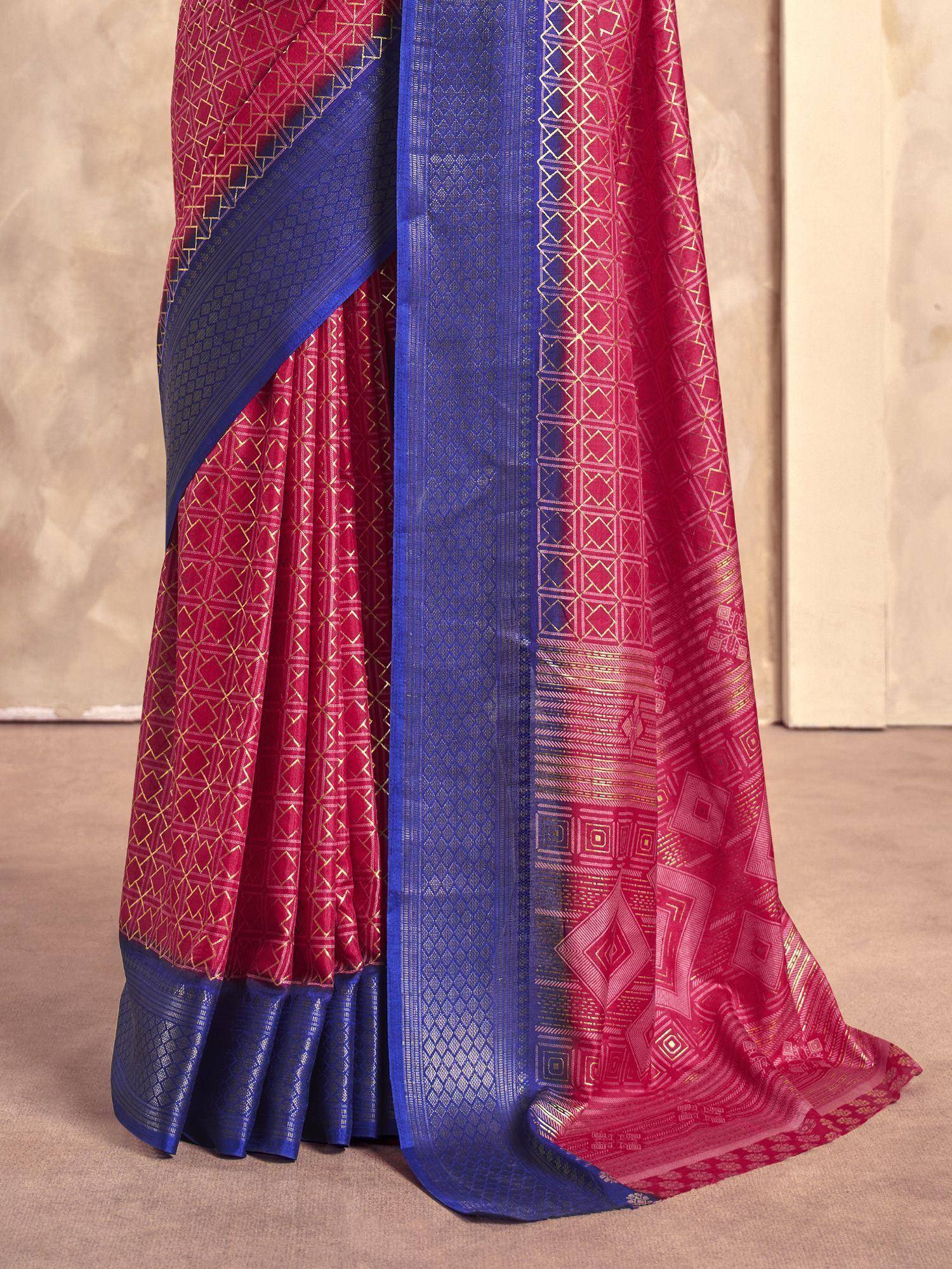 Red and blue designer saree with gold geometric patterns, perfect for ethnic occasions