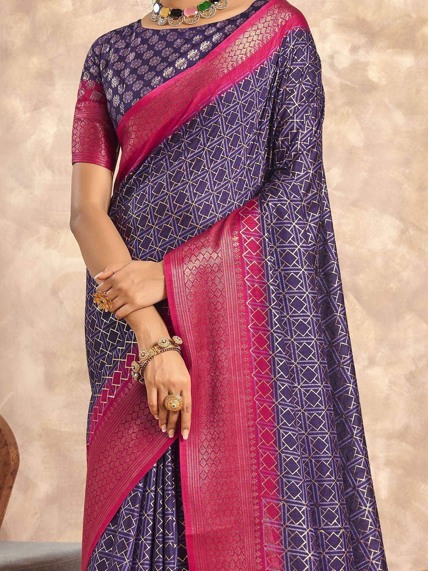 Purple and pink ethnic saree with geometric gold patterns and matching blouse, ideal for Indian occasions.