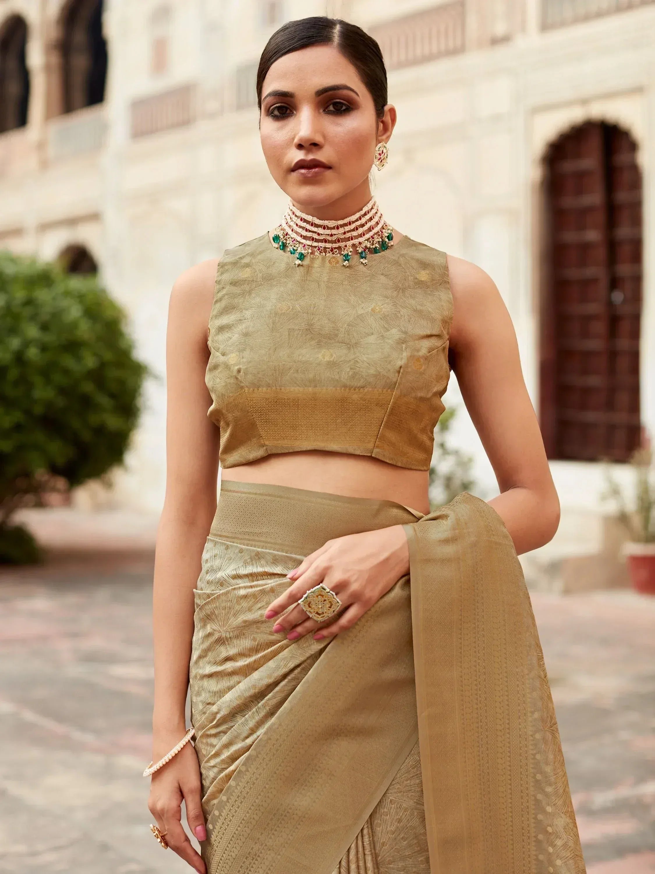 Elegant gold saree with matching blouse, traditional Indian ethnic wear, perfect for festive occasions