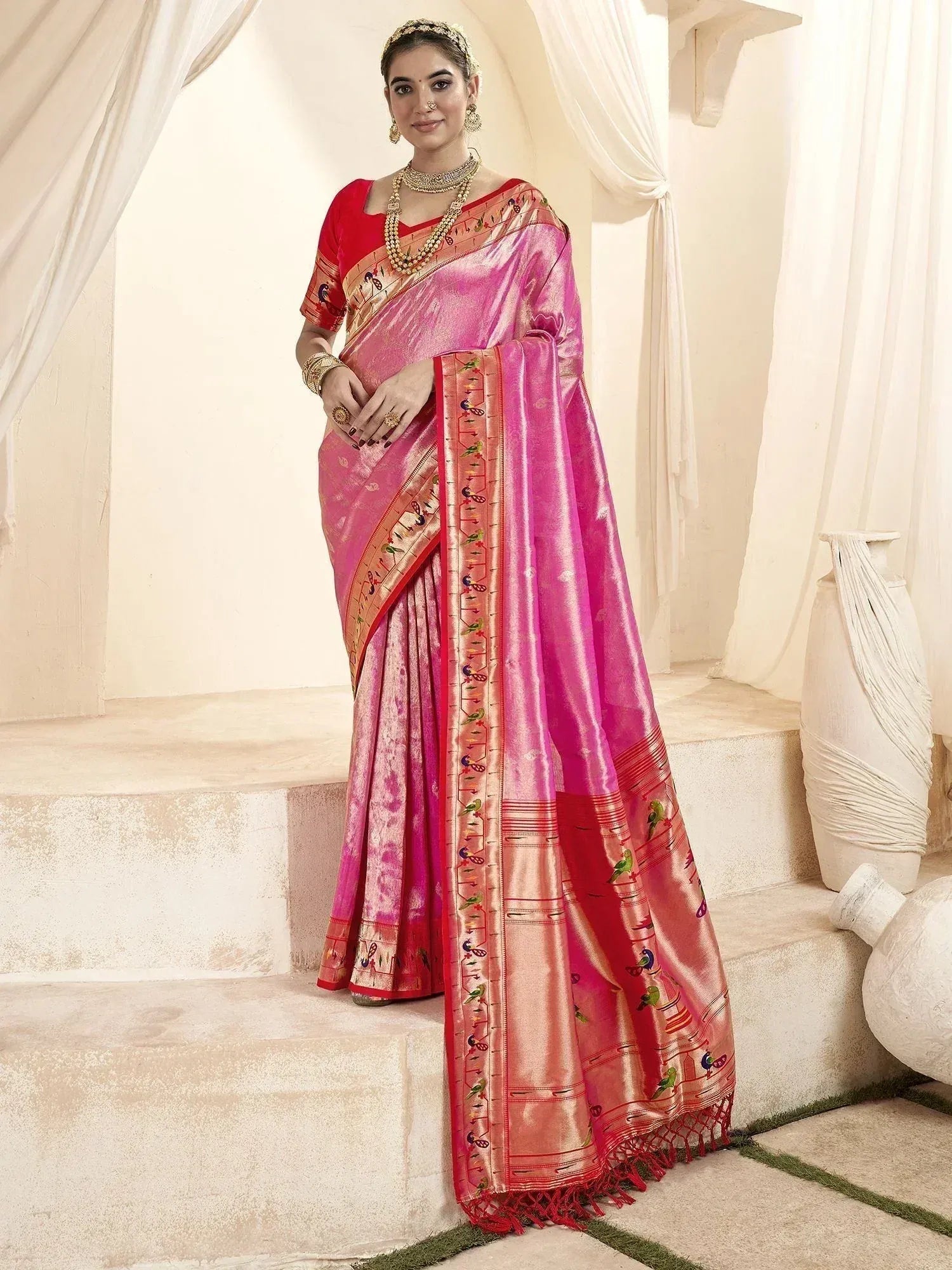 Pink and red designer saree with bird motifs, perfect for Indian ethnic wear occasions