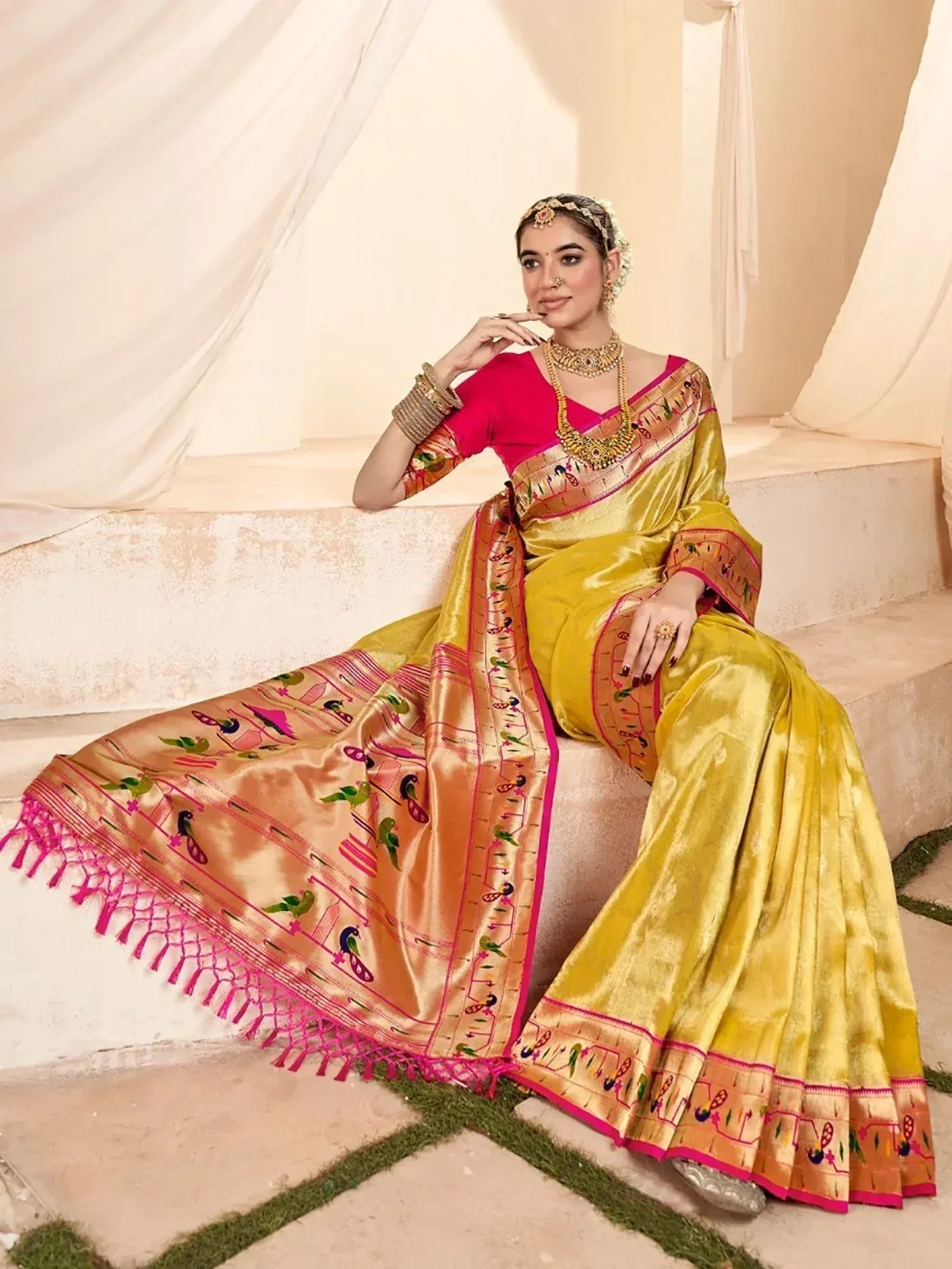Yellow and pink embroidered saree with bird motifs, traditional Indian ethnic wear for women