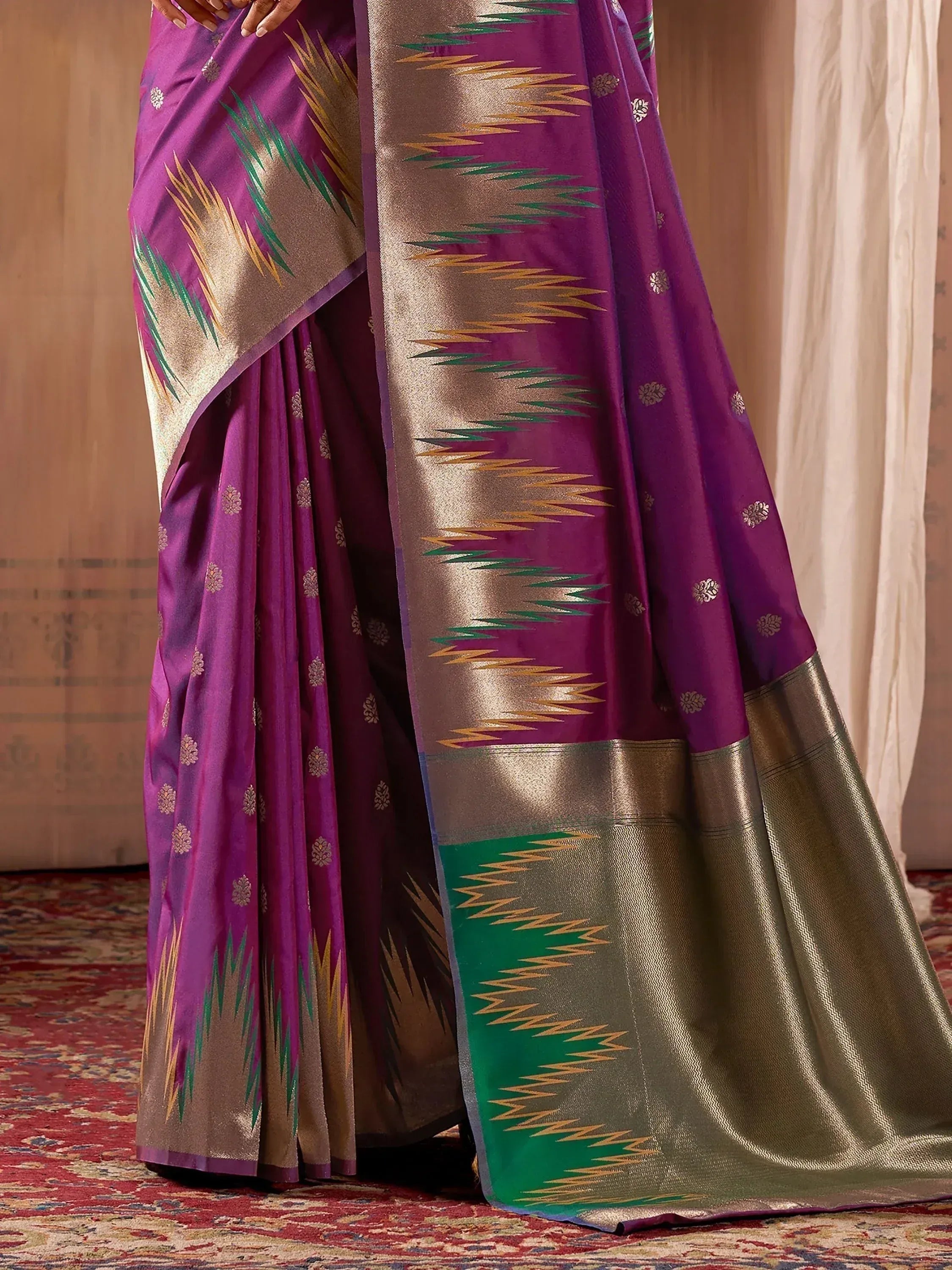 Purple ethnic saree with gold and green ikat border, traditional Indian designer wear