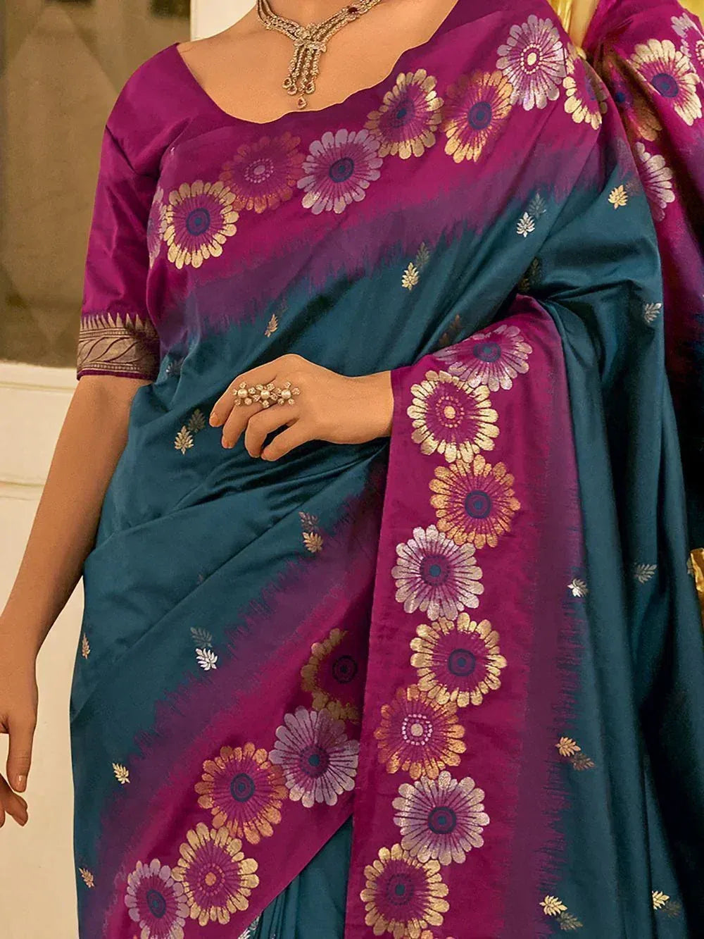 Purple and teal designer saree with floral print, perfect for ethnic occasions